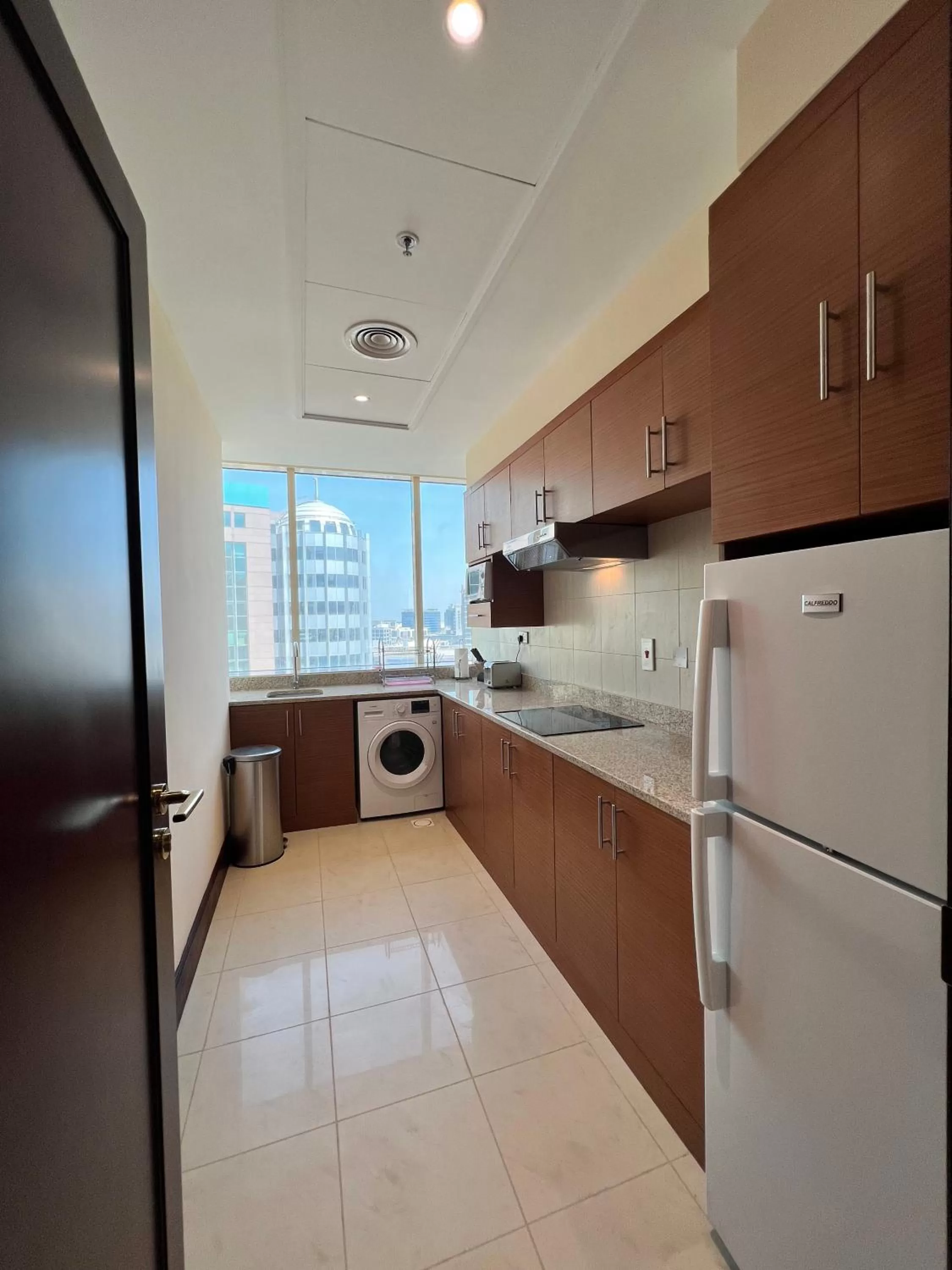 Kitchen or kitchenette in City Seasons Suites