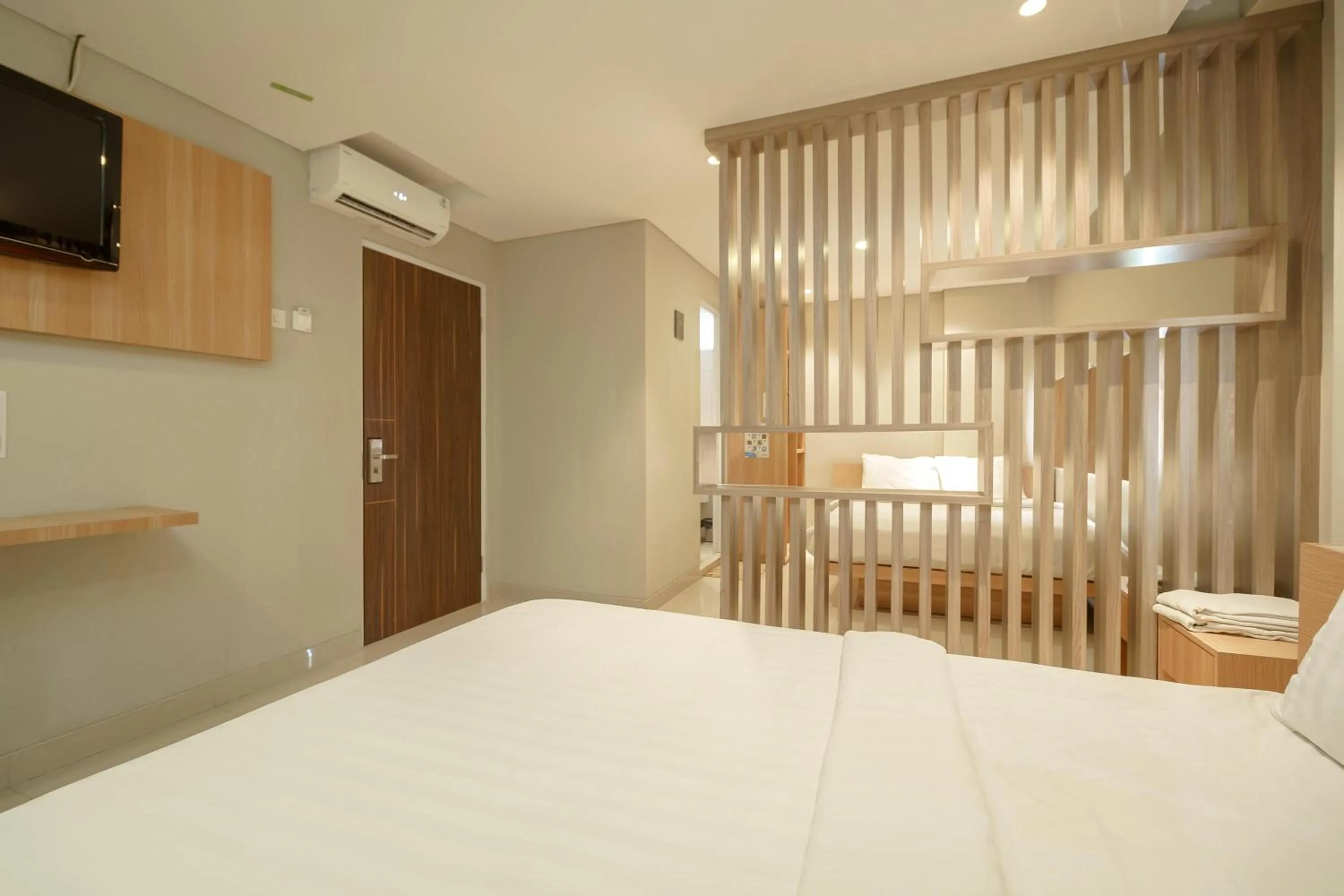 Bed in Green Apple Residence near Sarinah Mitra RedDoorz