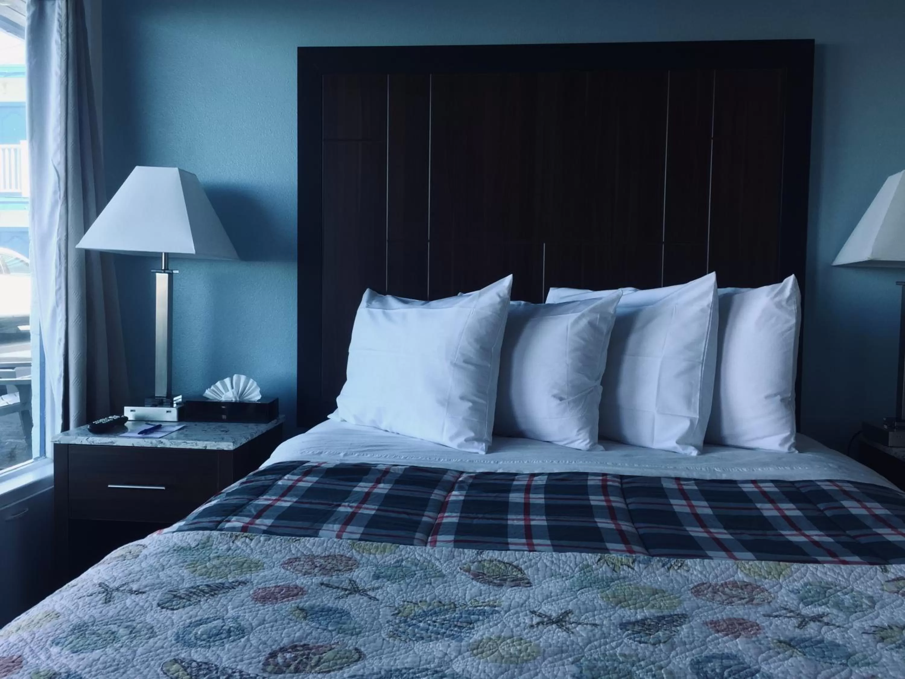 Bed in Dolphin Cove Motel