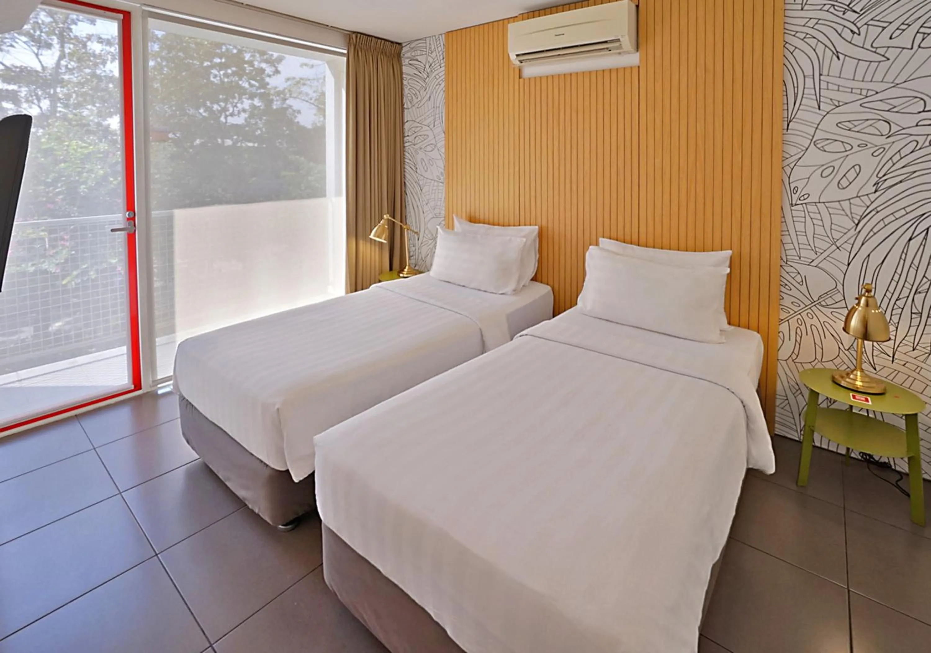 Bed in Malaka Hotel Bandung