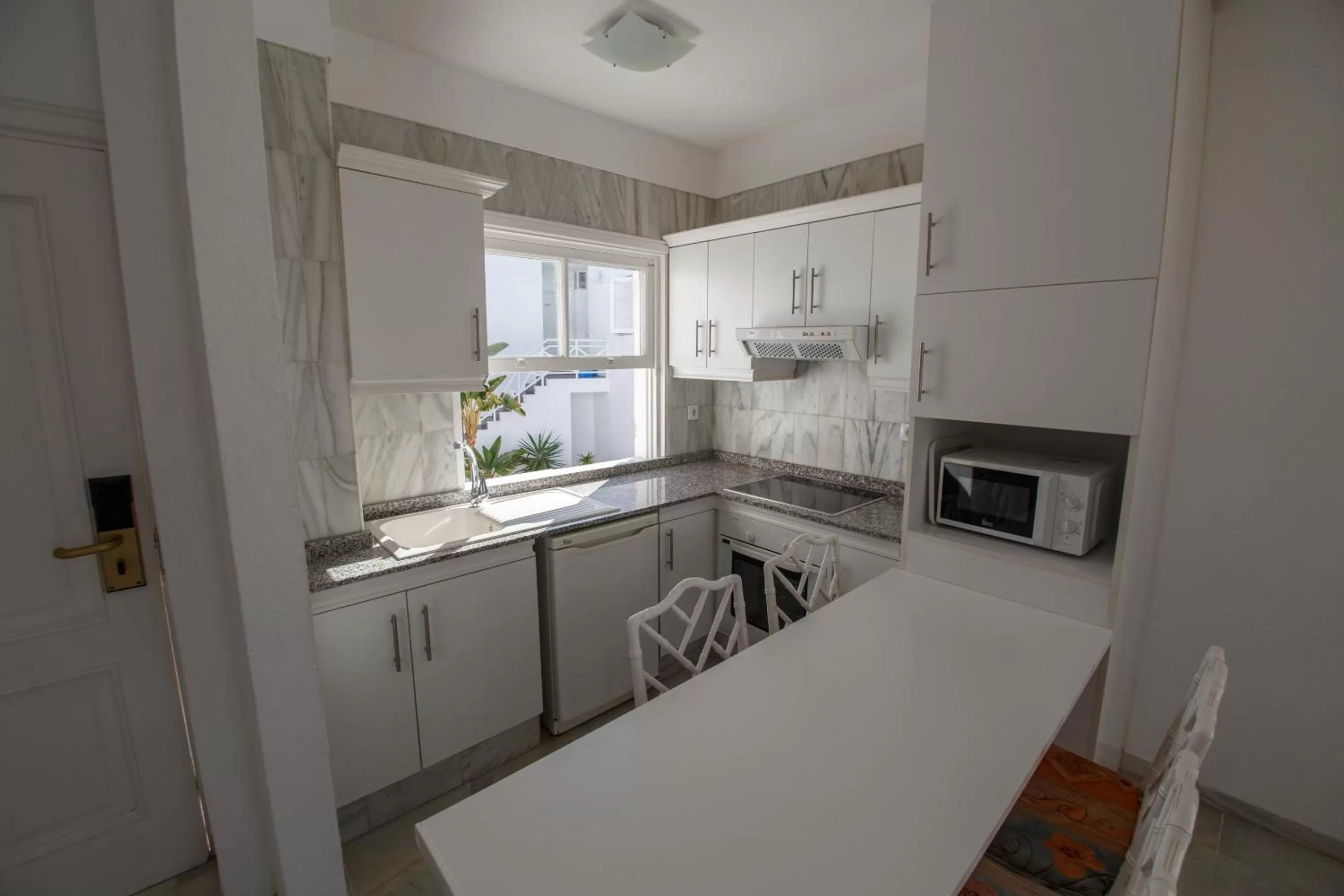 Kitchen or kitchenette in Lagos de Fañabé Beach Resort