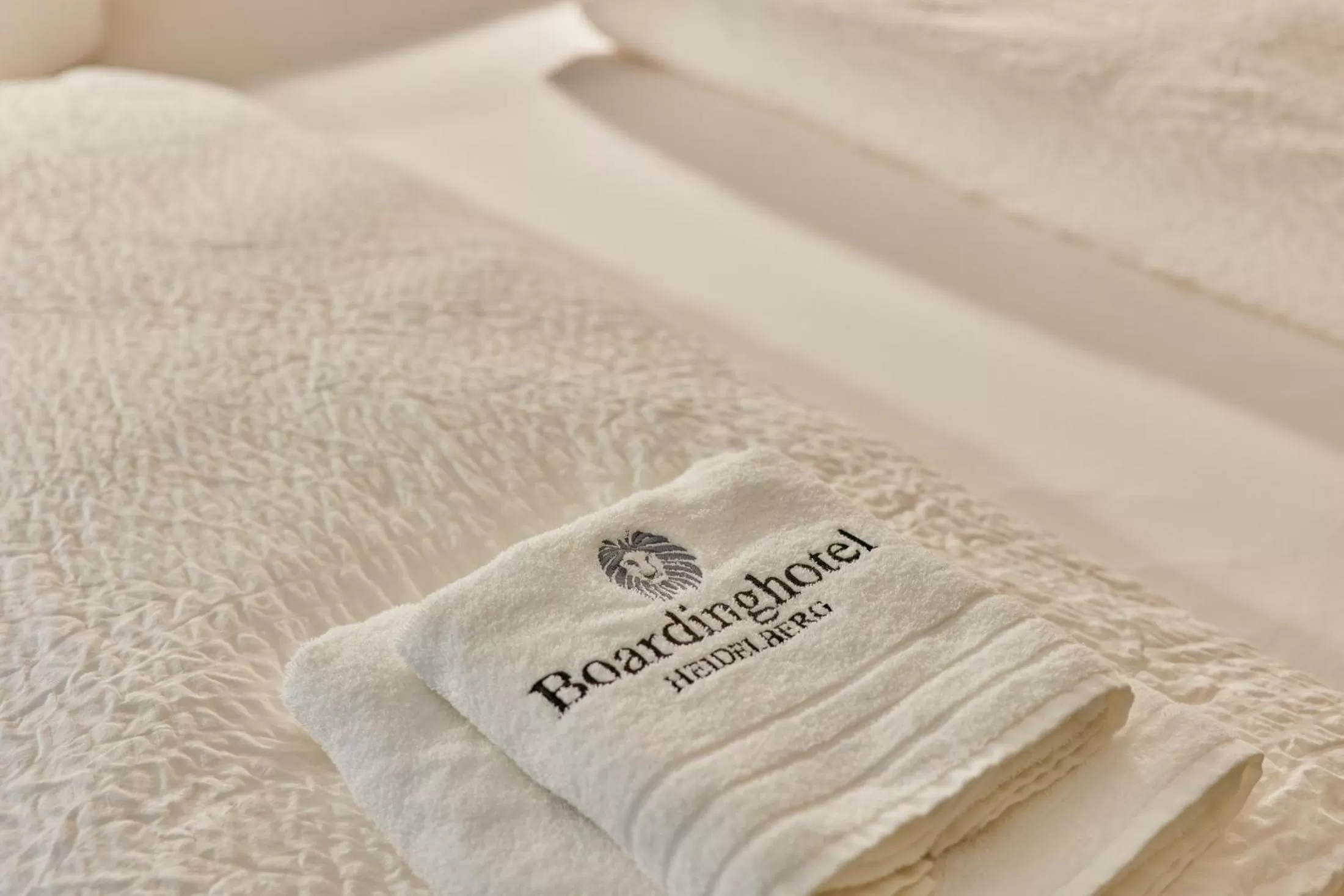 towels, Bed in Boardinghotel Premium Heidelberg