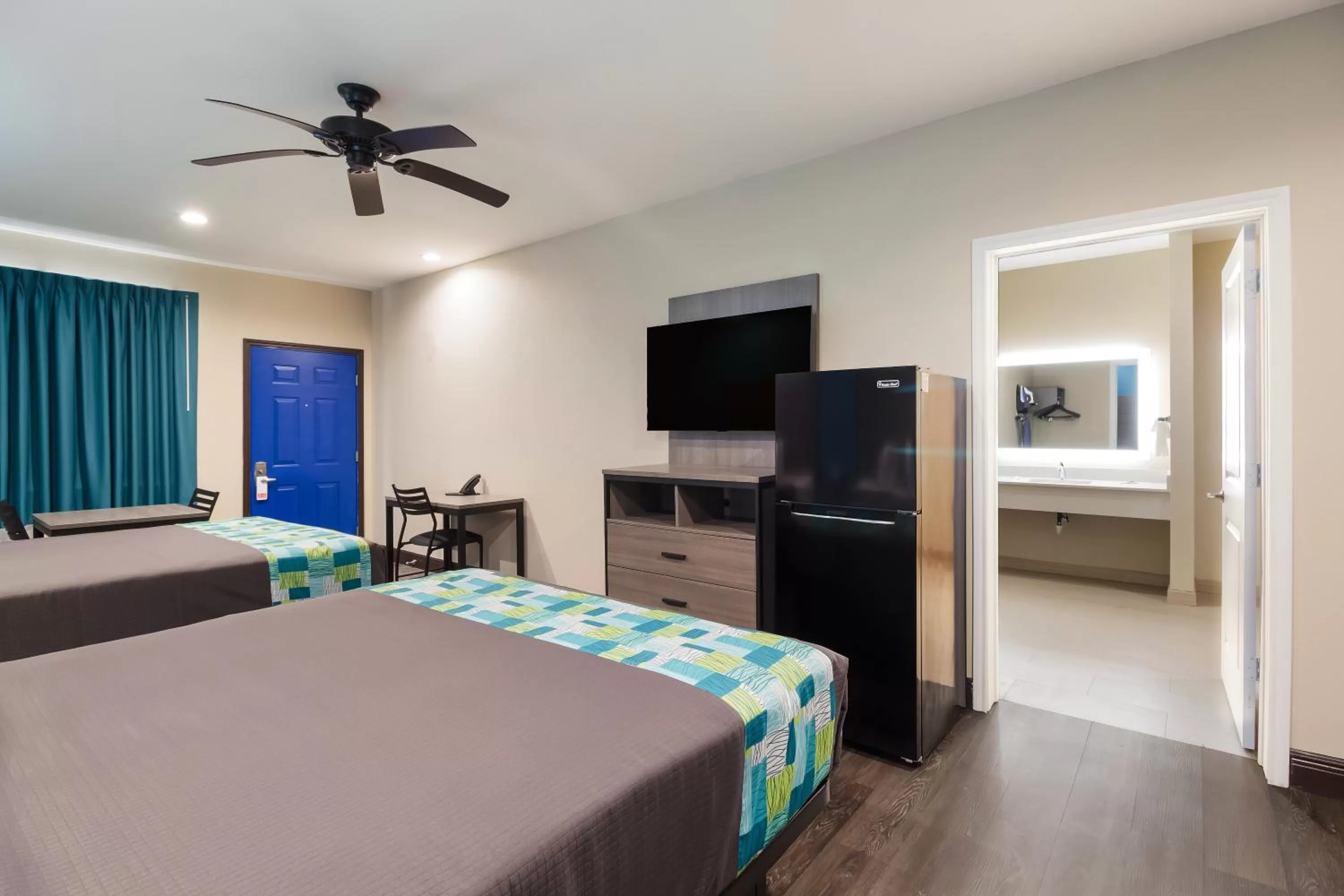 Bed in Scottish Inns & Suites Hitchcock-Santa Fe