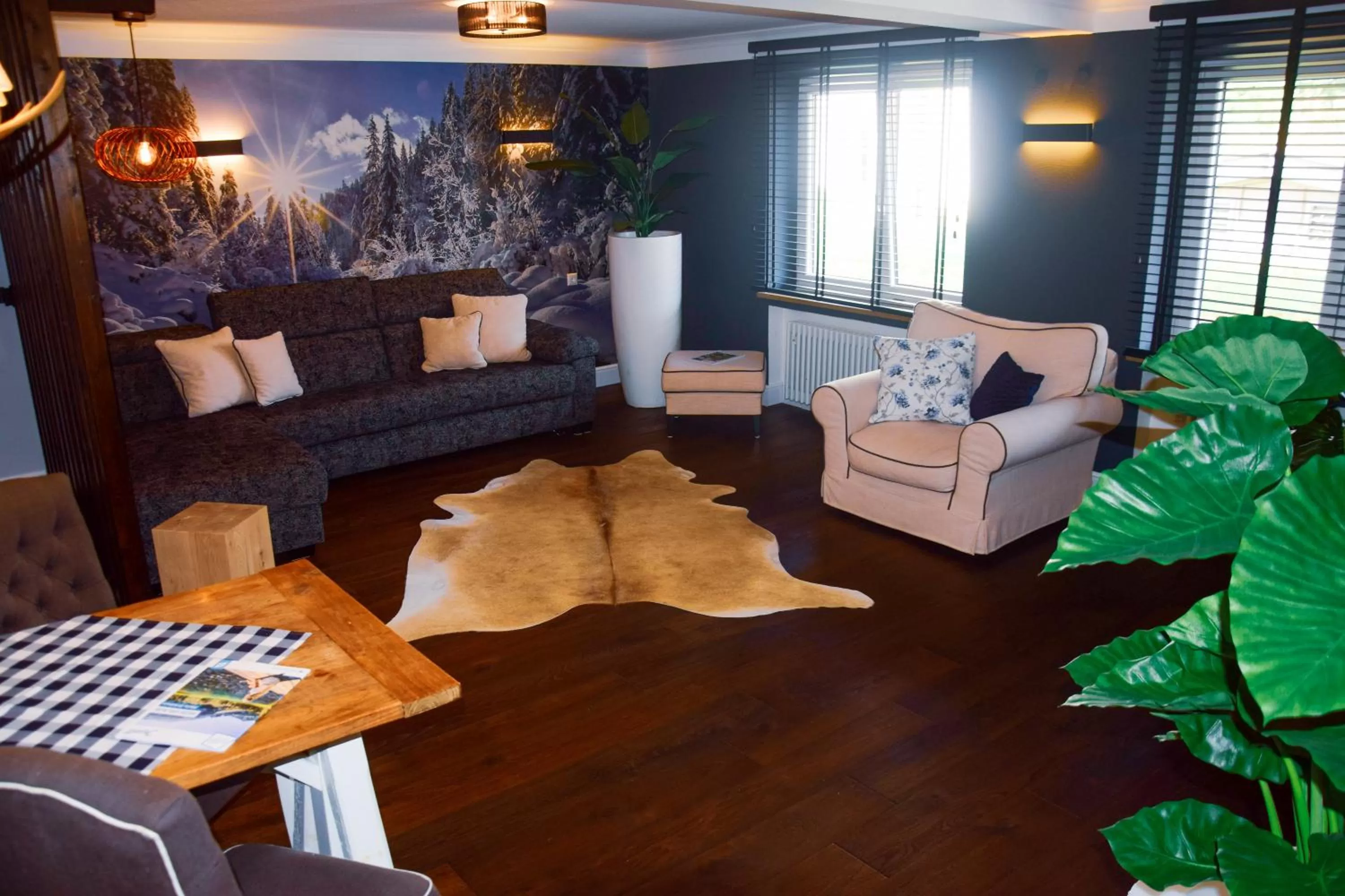 Living room, Seating Area in Sauna & Whirlpool - ALPENLIEBE APARTments