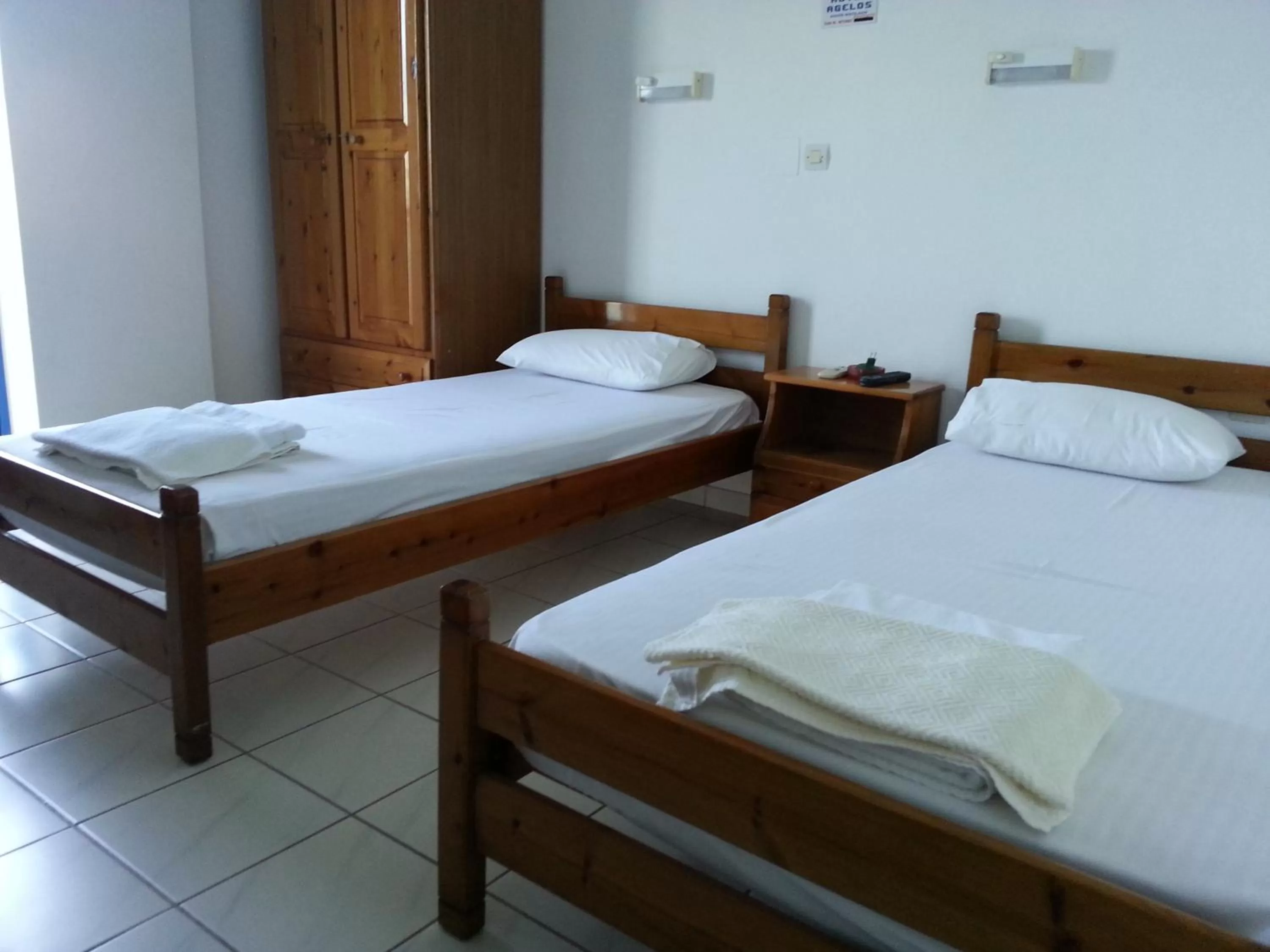 Bed in Angelos Hotel