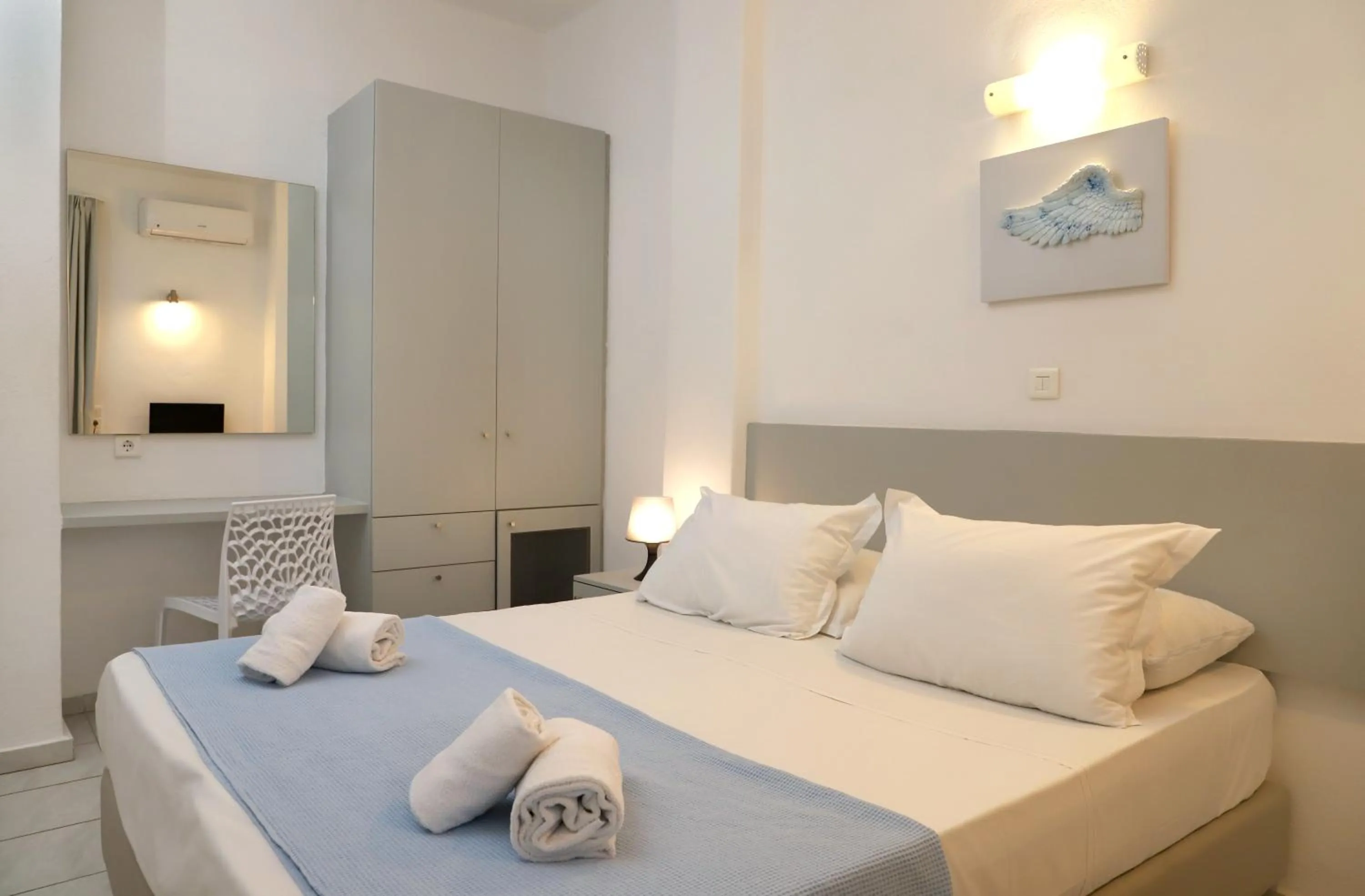 Photo of the whole room, Bed in Elounda Krini Hotel