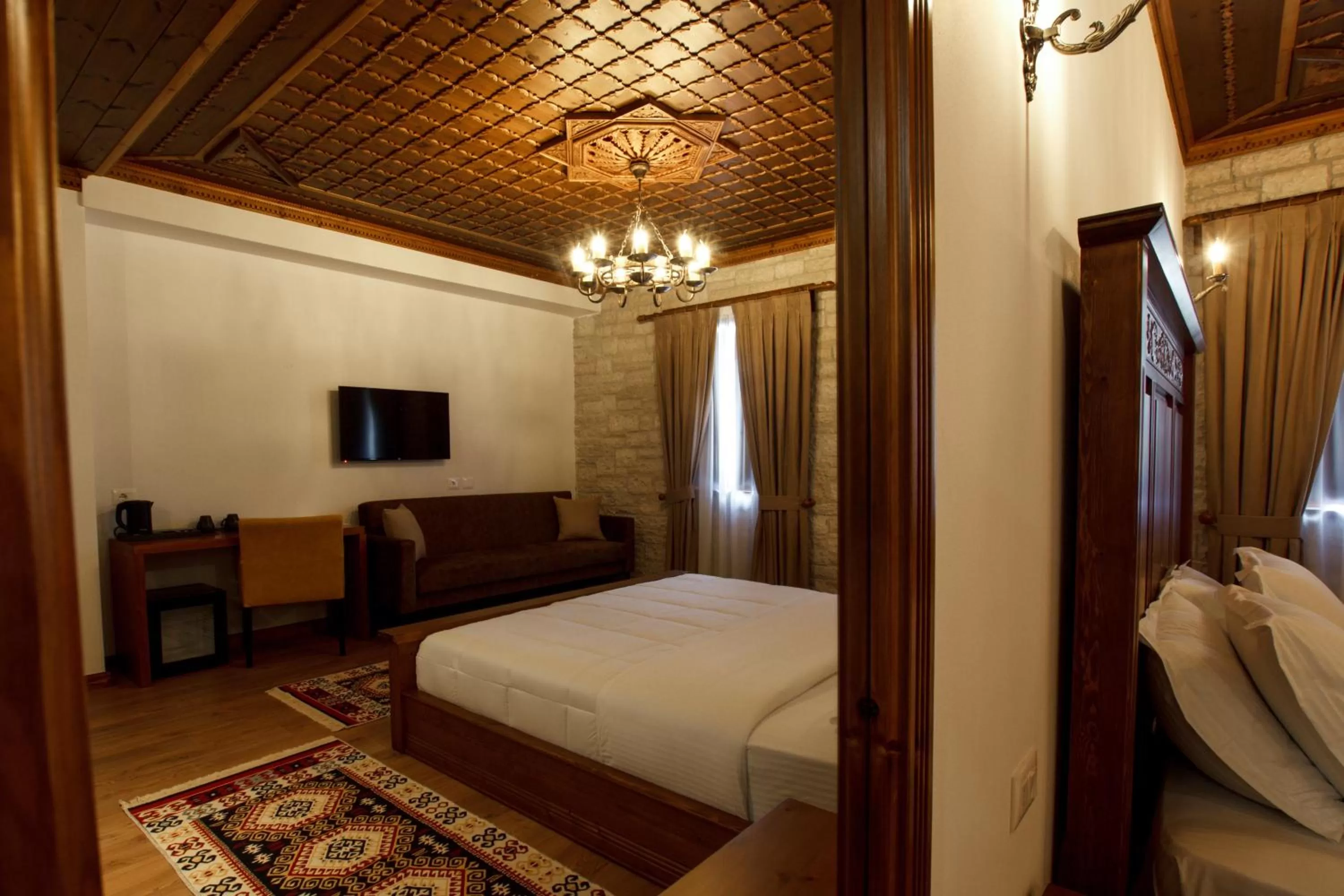 Bed in Rose Garden Hotel