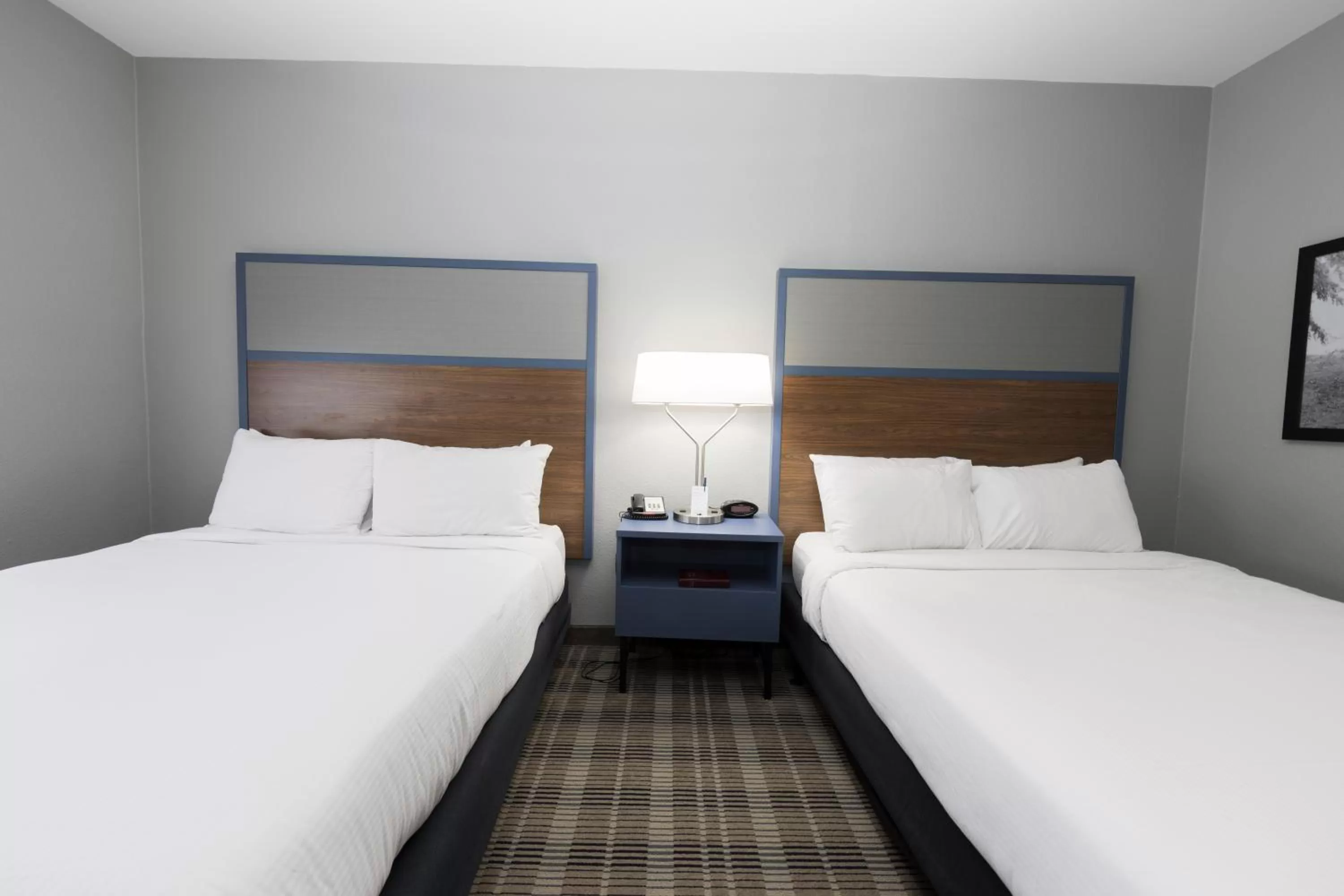 Queen Room with Two Queen Beds - Non-Smoking in AmericInn by Wyndham Duluth