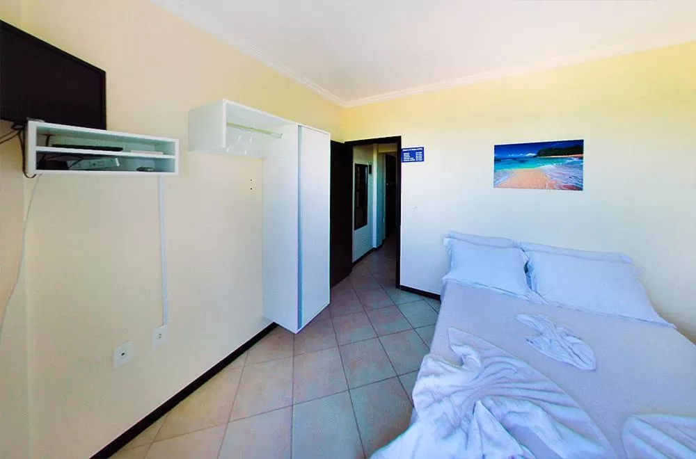 TV/Entertainment Center in Pousada OceAnas Frente Mar Estaleiro