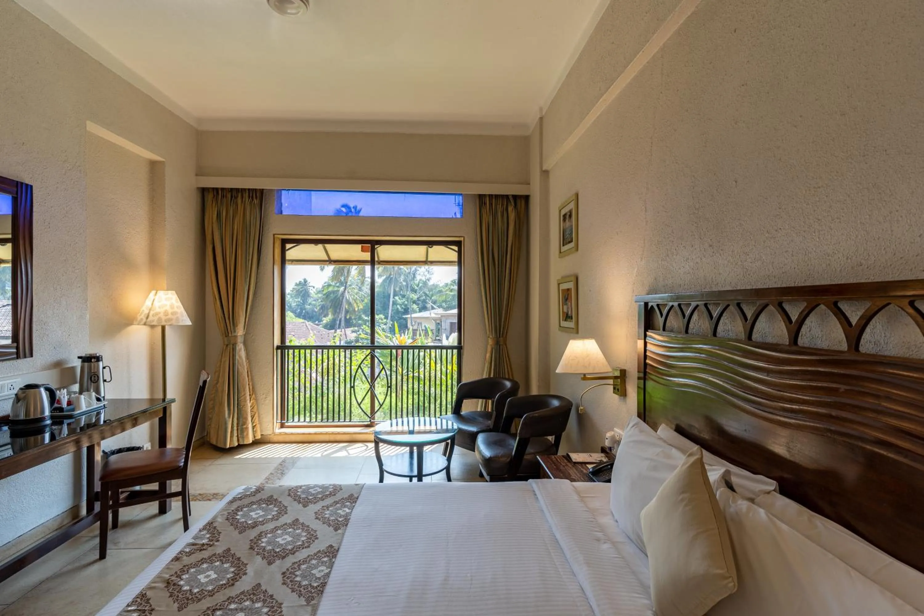 Bed in Neelam's The Grand Hotel Goa