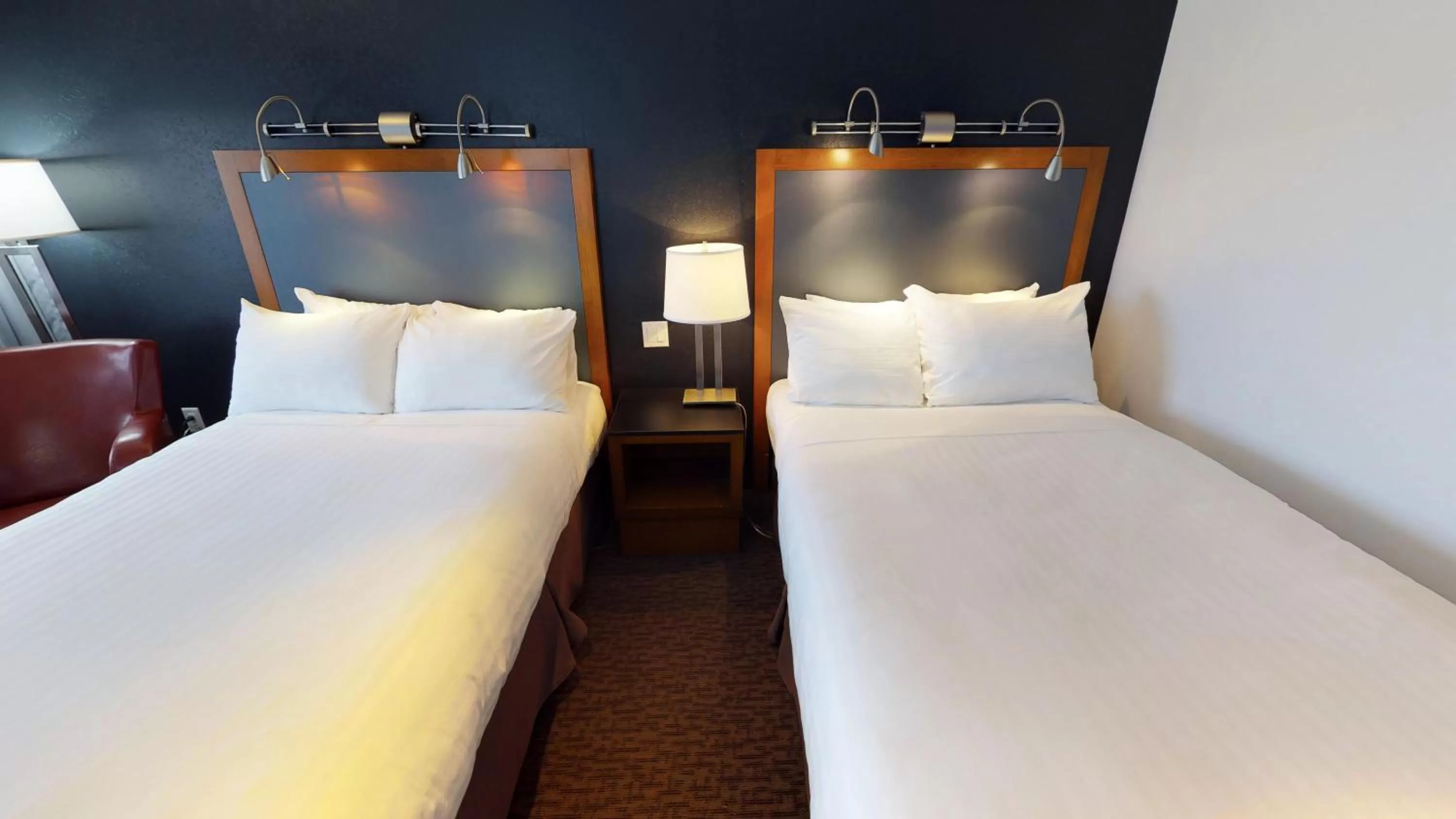 Photo of the whole room, Bed in Riotel Matane