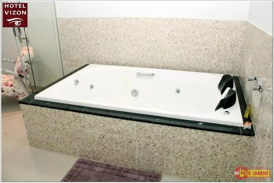 Bathroom in Hotel e Locadora Vizon