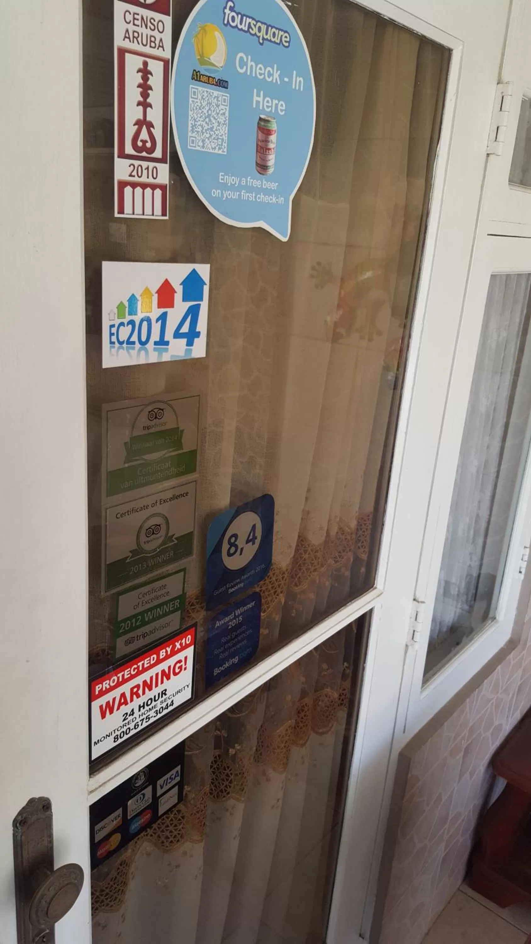 Logo/Certificate/Sign in A1 Apartments Aruba