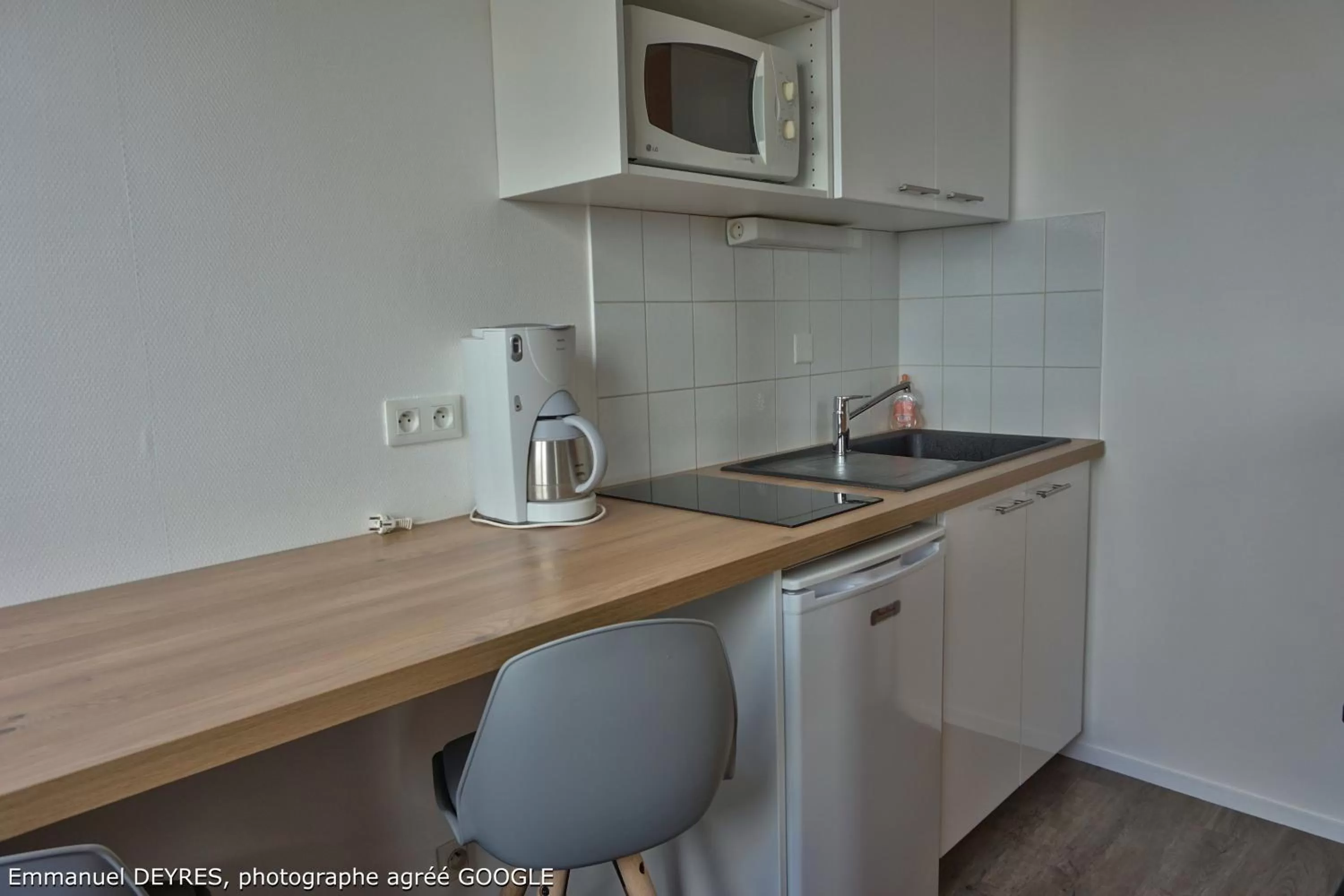 Kitchen or kitchenette in Hôtel de Bretagne