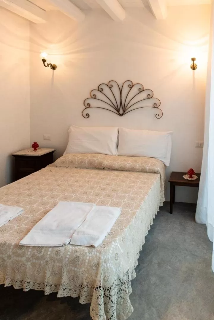 Bed in Sanbartolomeo Casa & Putìa