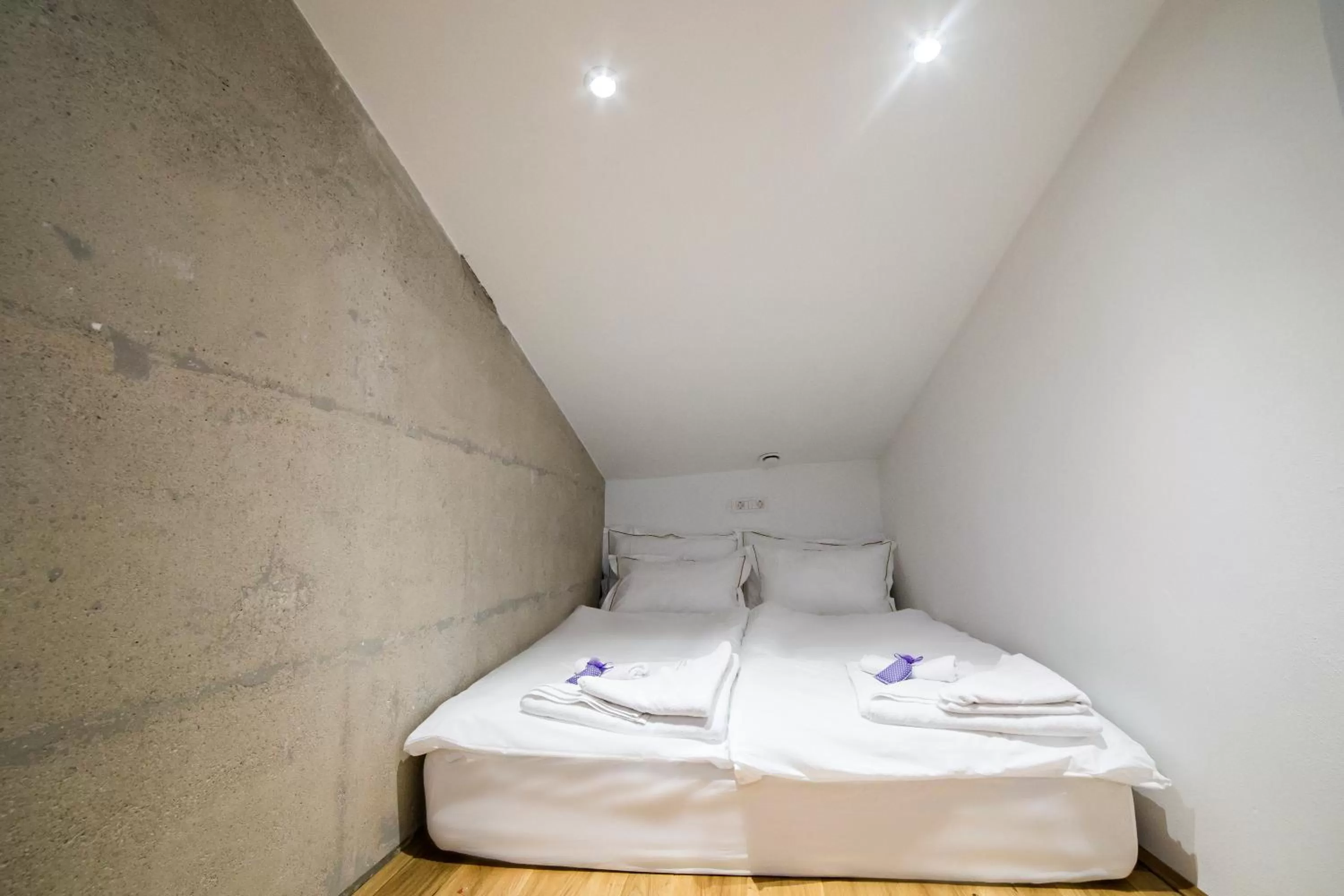 Bed in MEMENTO B&B Piran