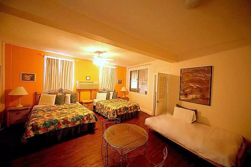 Bed in Casa del Caribe Inn