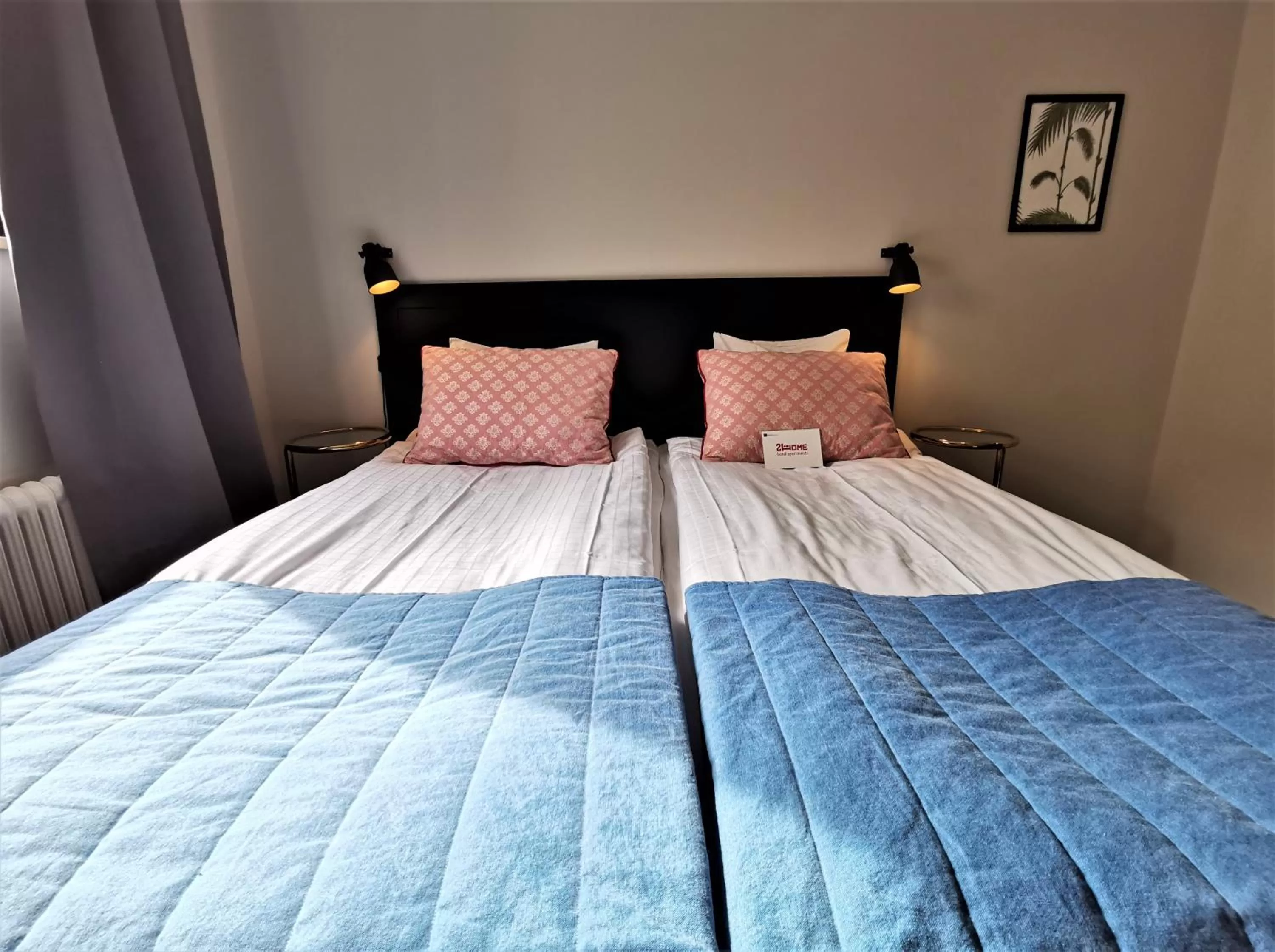 Bed in 2Home Hotel Gävle