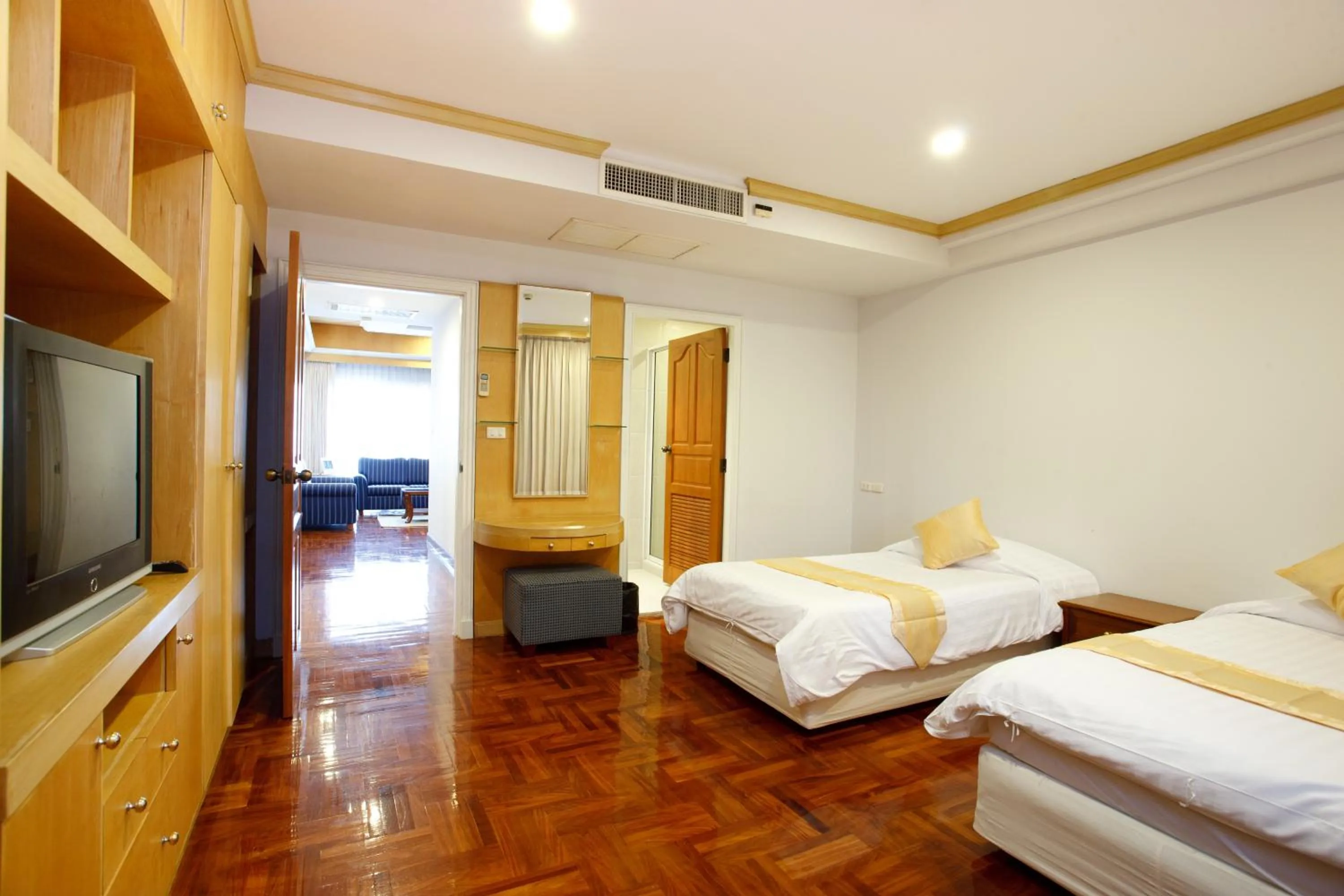 Bed in Chaidee Mansion