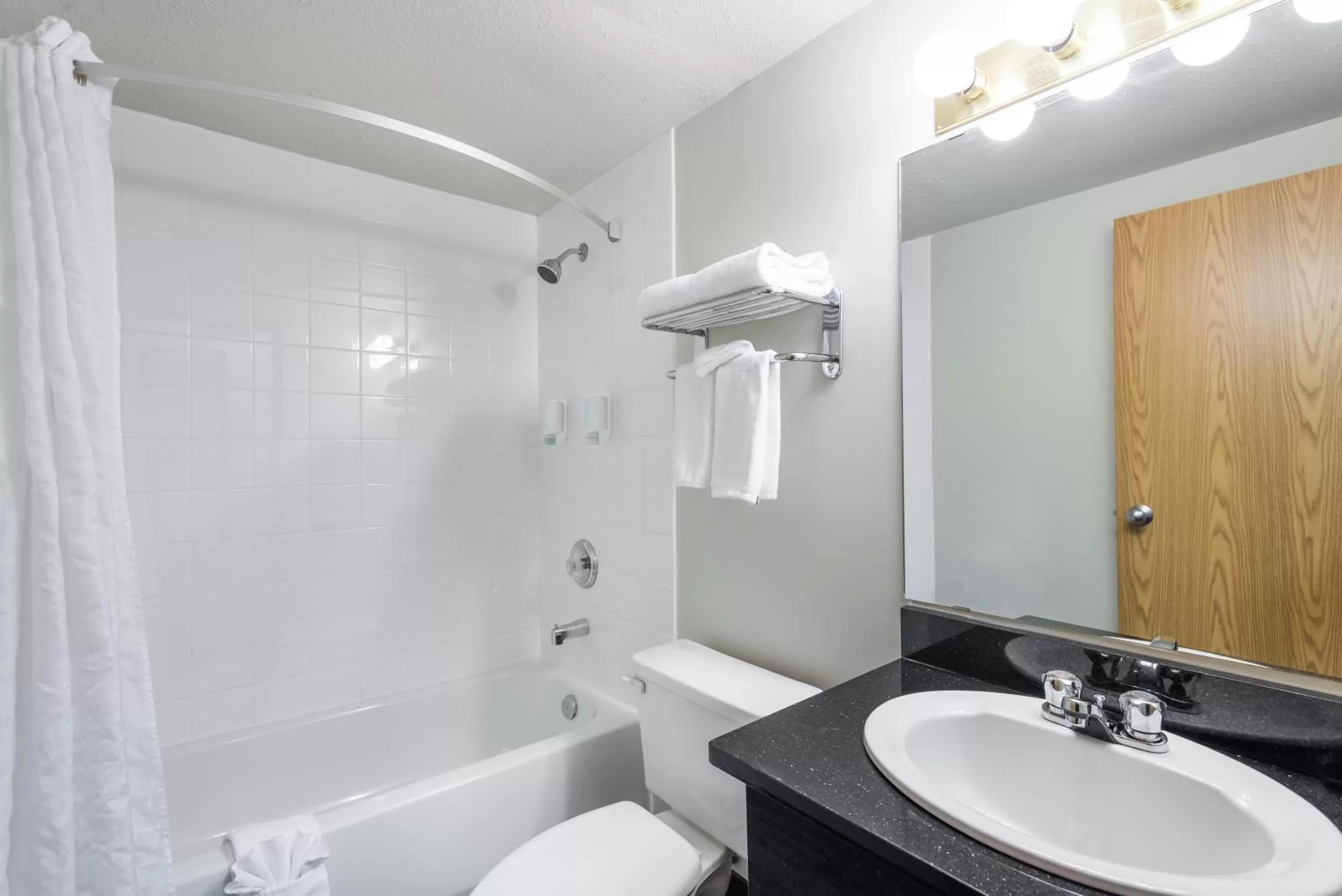Shower in Super 8 by Wyndham Grande Prairie