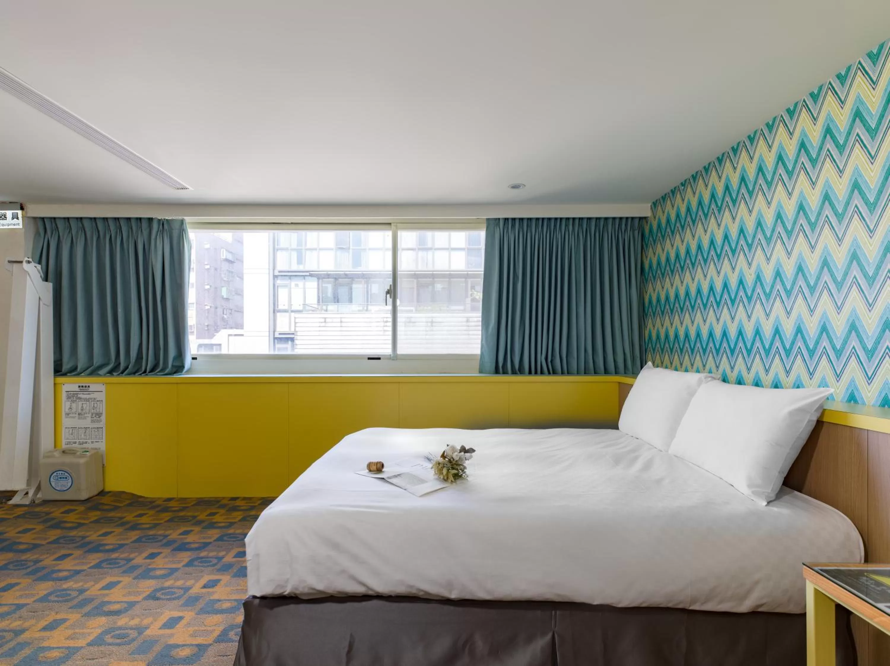 Bed in Ximenhotel-Xining西門大飯店-西寧館