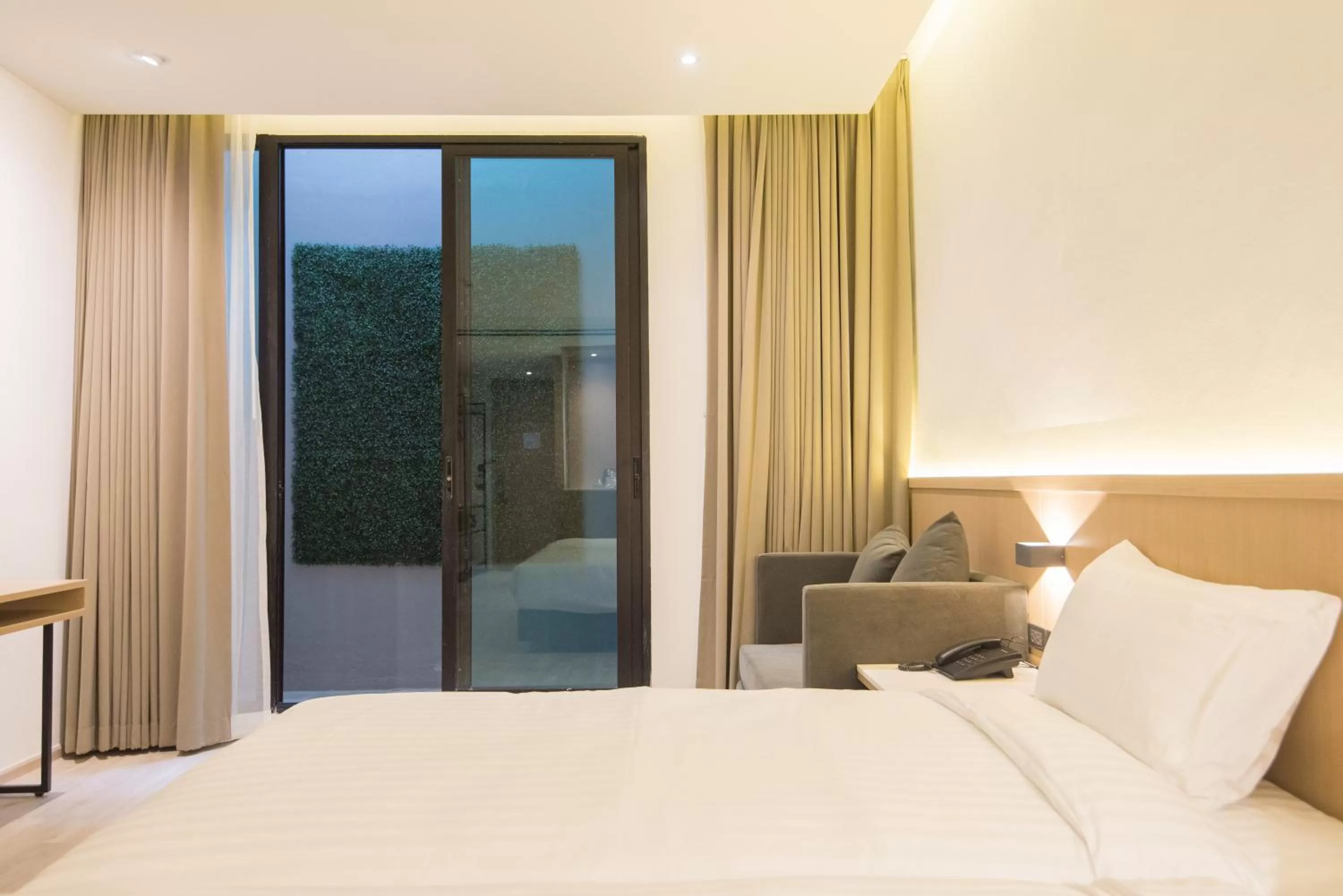 Bed in Madison Bangkok Hotel