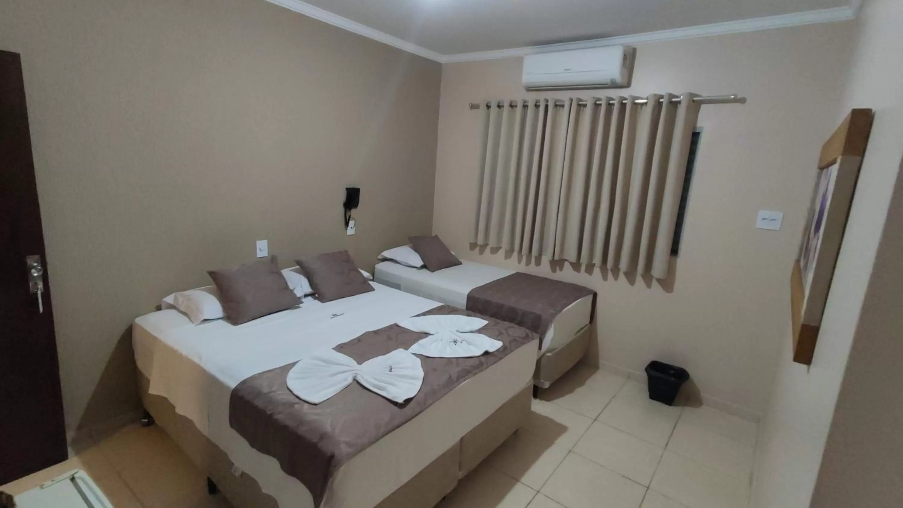 Bed in Hotel Barretos