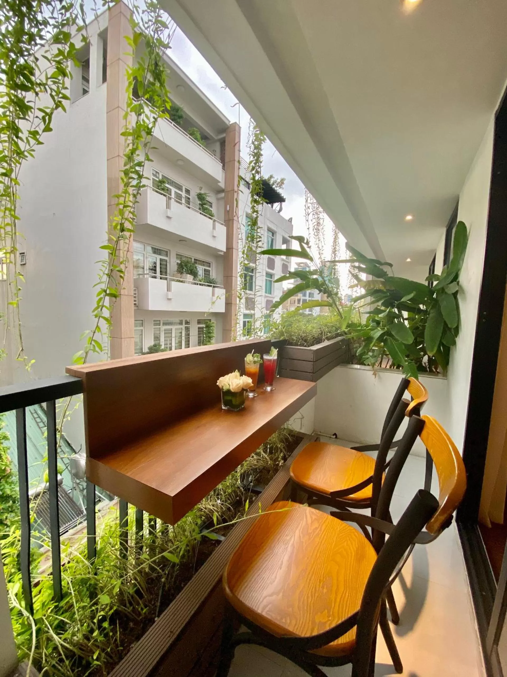 Balcony/Terrace, Seating Area in UpTown Hotel