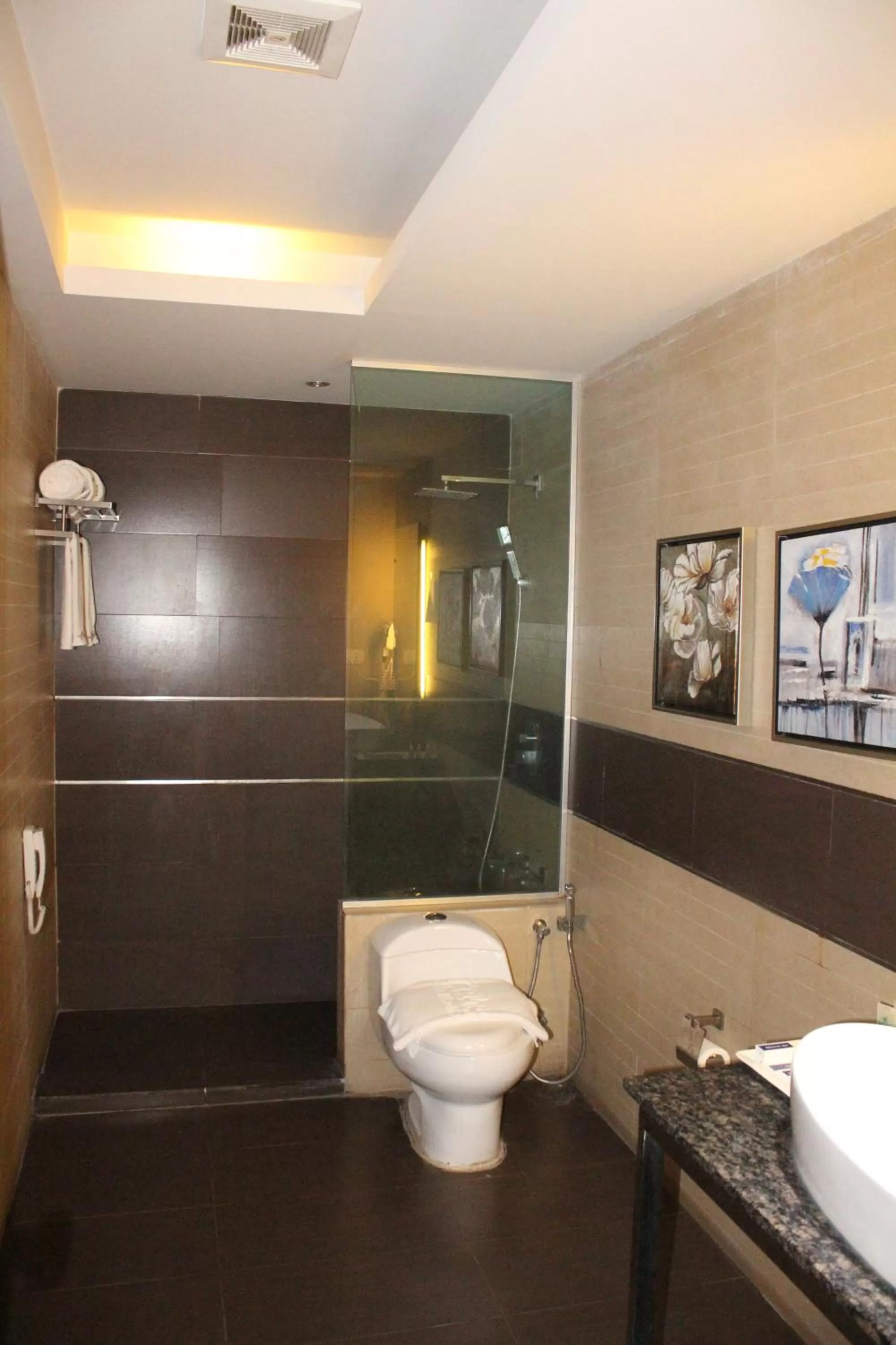 Bathroom in D'more Dhaka Hotel & Resort
