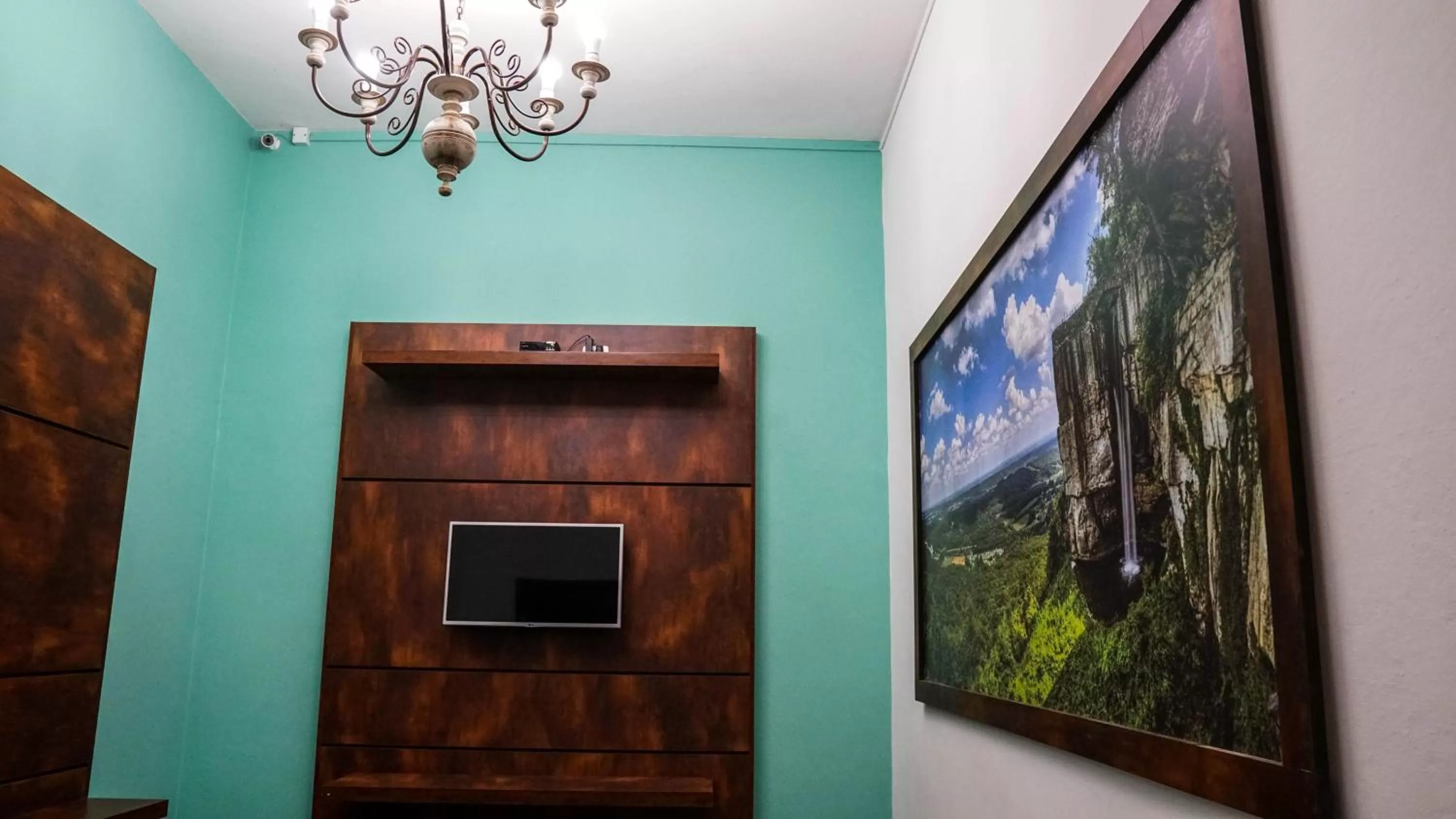 TV/Entertainment Center in Pousada o Amanhecer