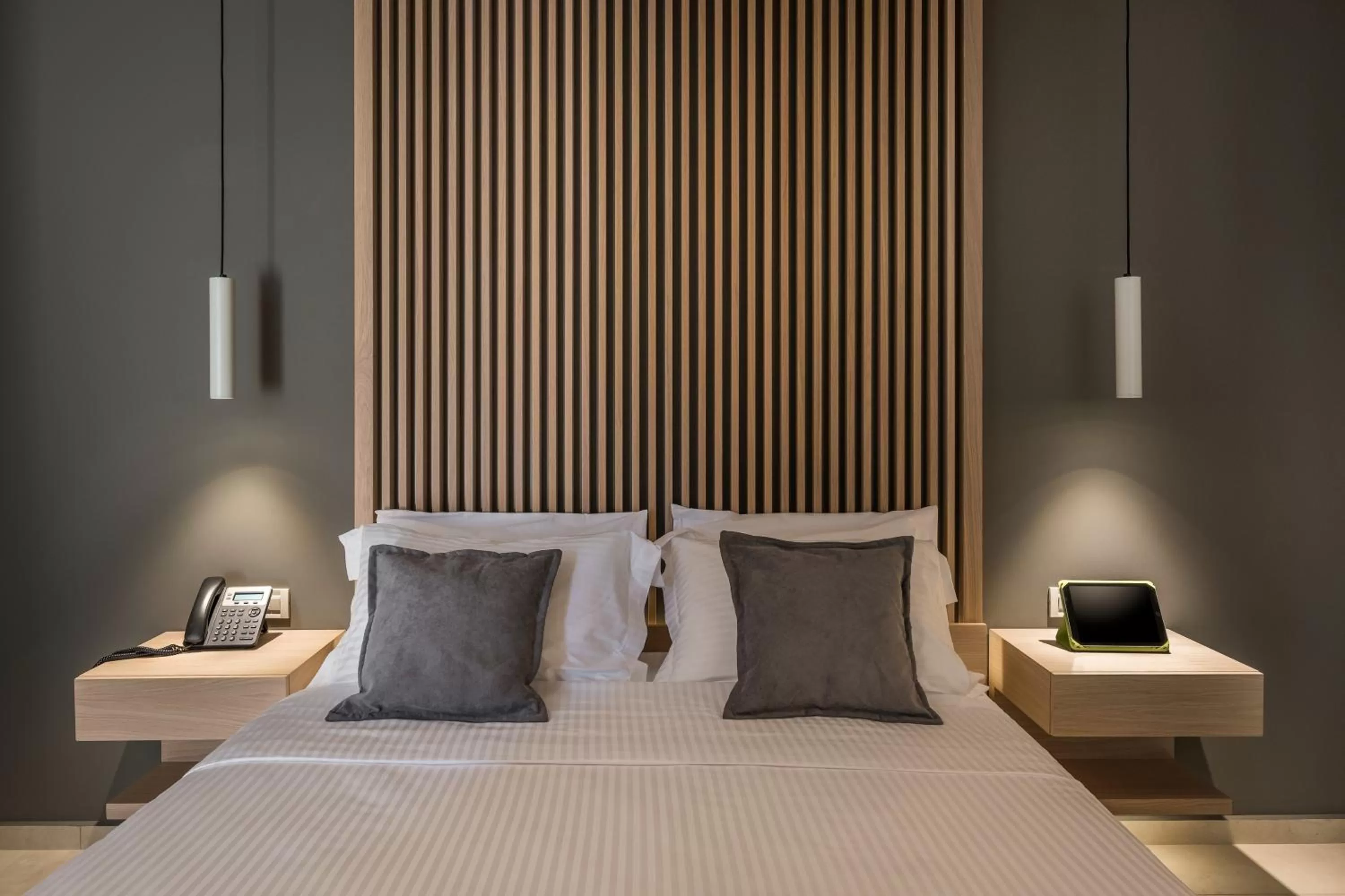 Bed in Trianon Luxury Apartments & Suites