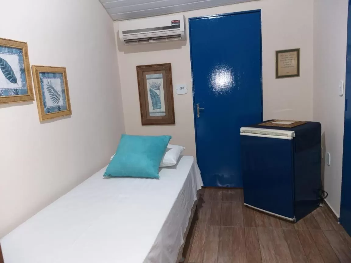 Bed in Pousada Dois Rios