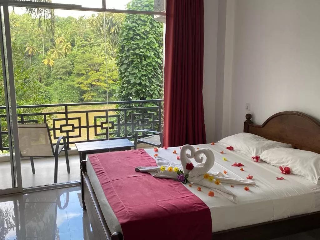 Bed in Kandy Rivers Edge Nature Resort