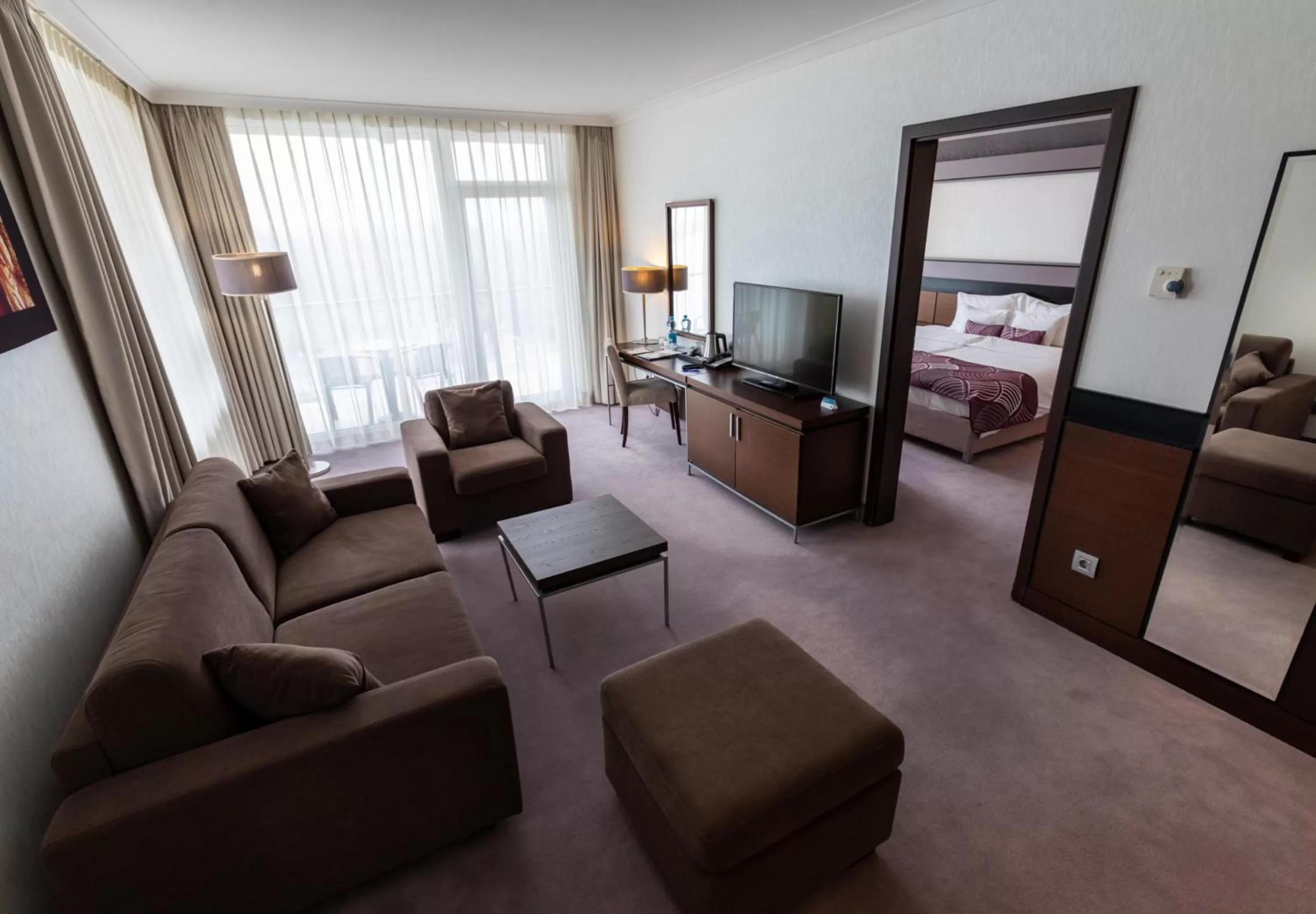 Living room, Bed in Aquaworld Resort Budapest