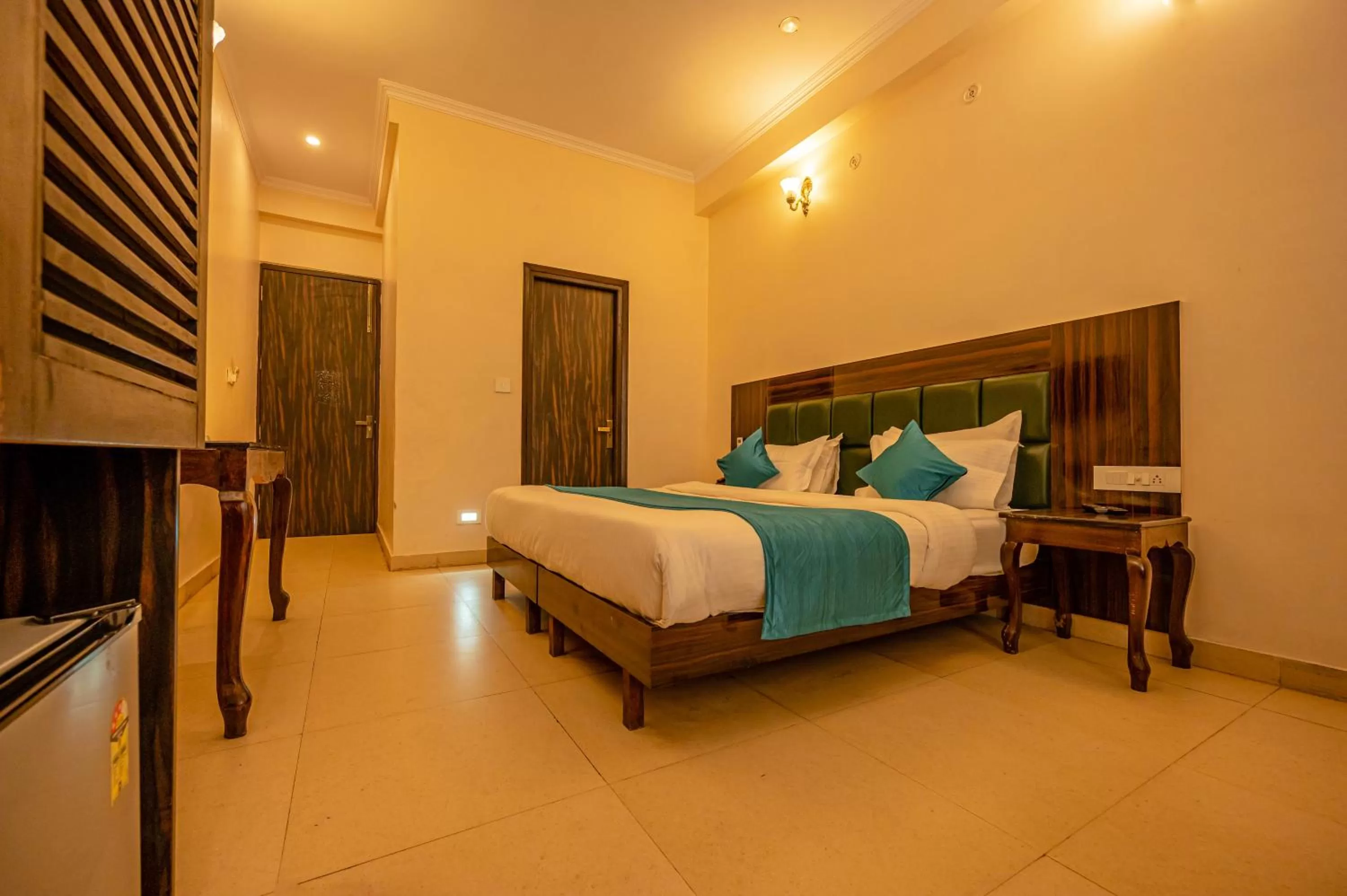 Bed in Hotel Rishikesh Grand by Kool Stays
