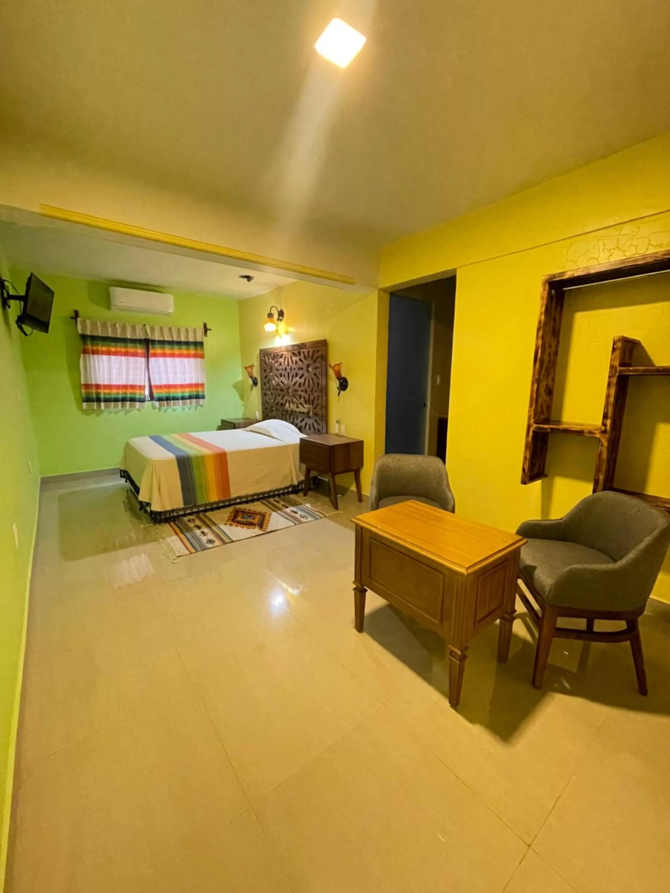 Living room, Bed in Suites Cárdon