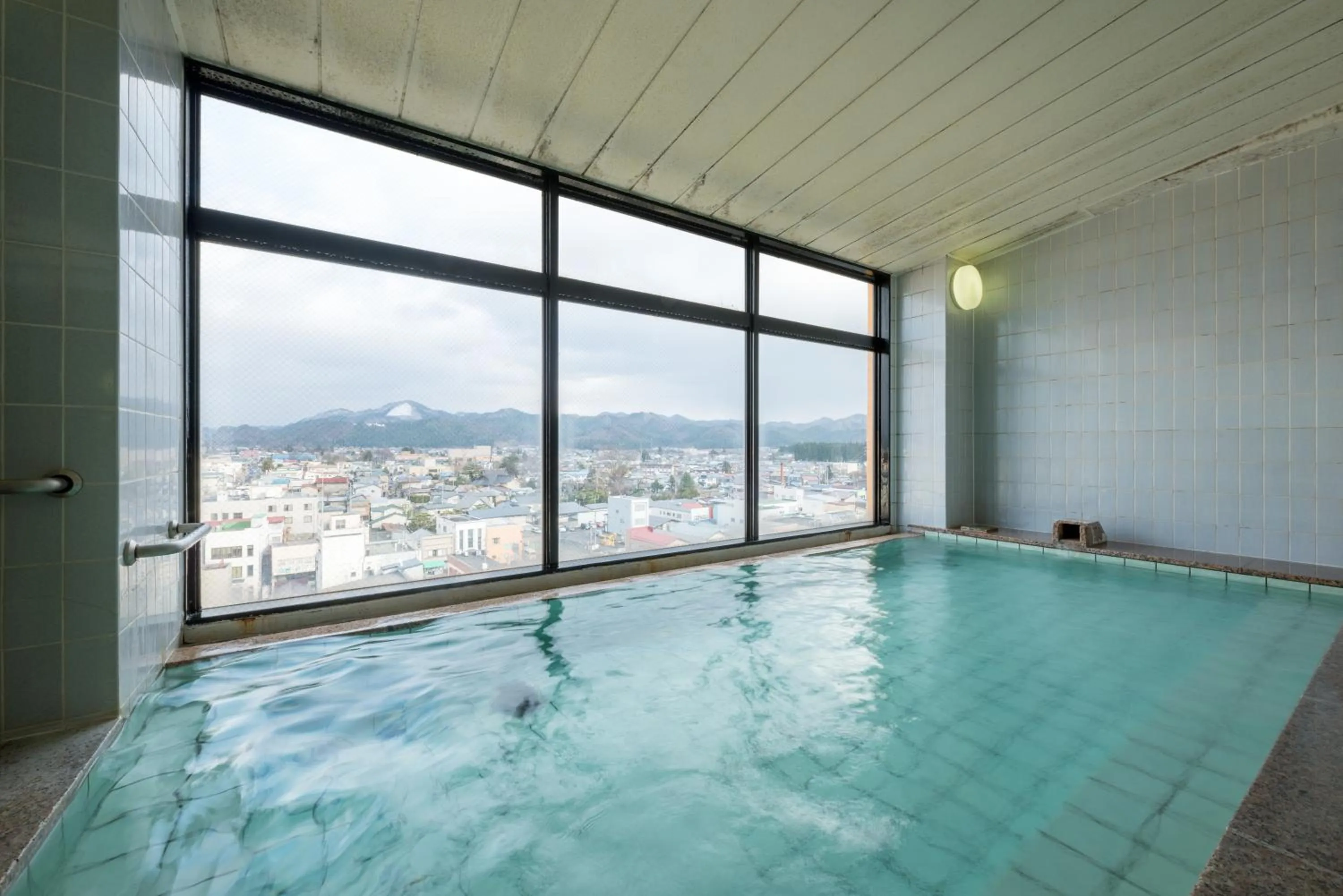 Bed in Annex Royal Hotel