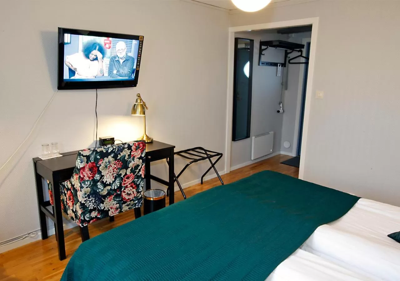 Seating area, Bed in Rasta Hallandsåsen