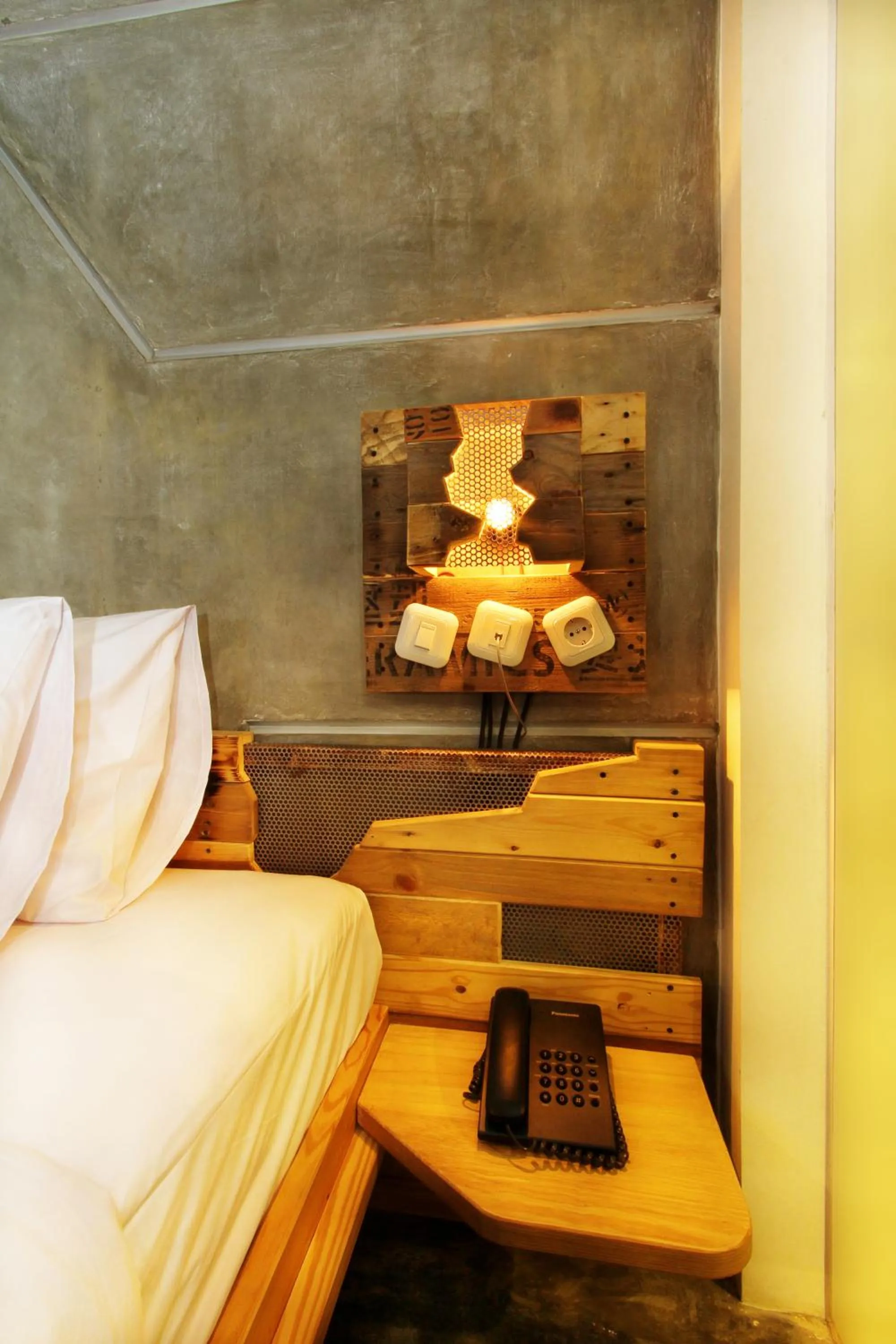 Decorative detail, Bed in Greenhost Boutique Hotel Prawirotaman