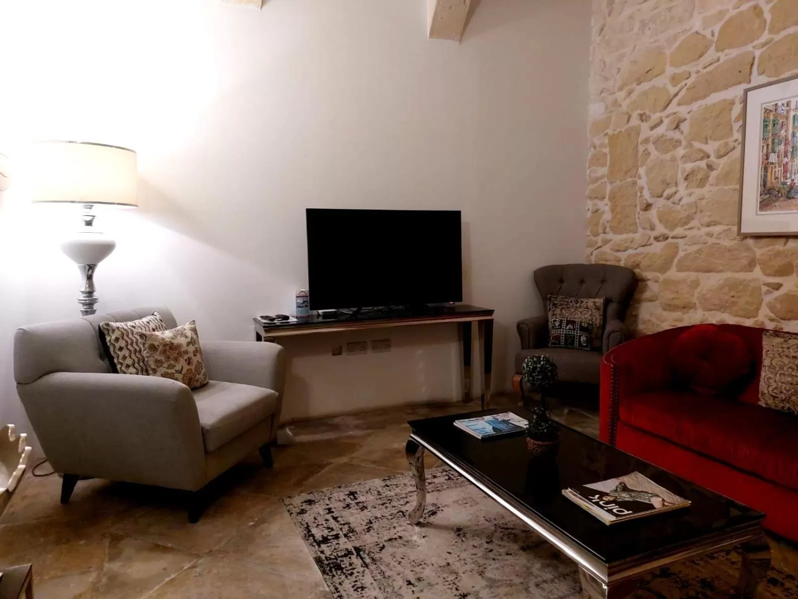 Communal lounge/ TV room in Casa Birmula Boutique Hotel