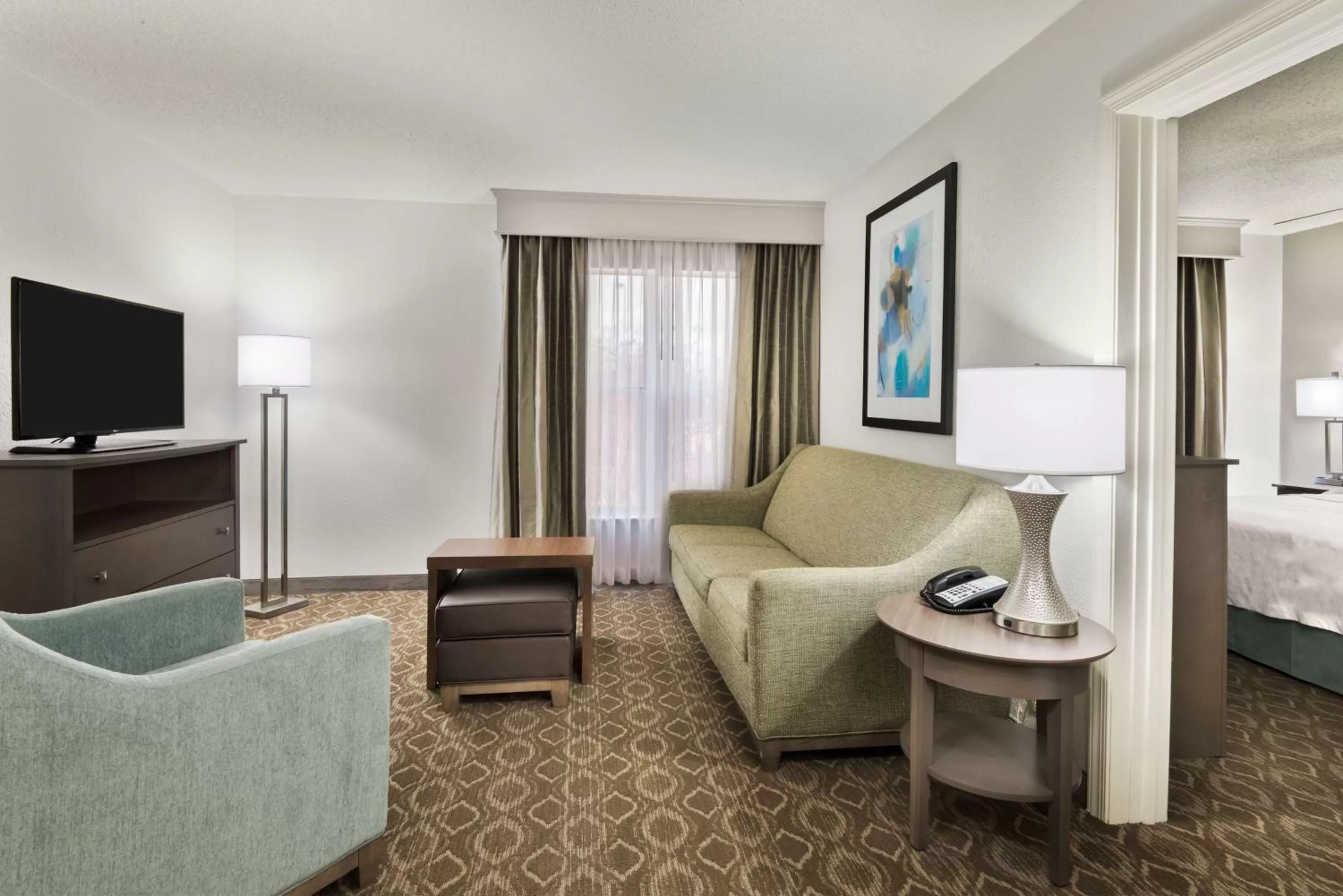 Living room, Bed in Homewood Suites by Hilton Baton Rouge