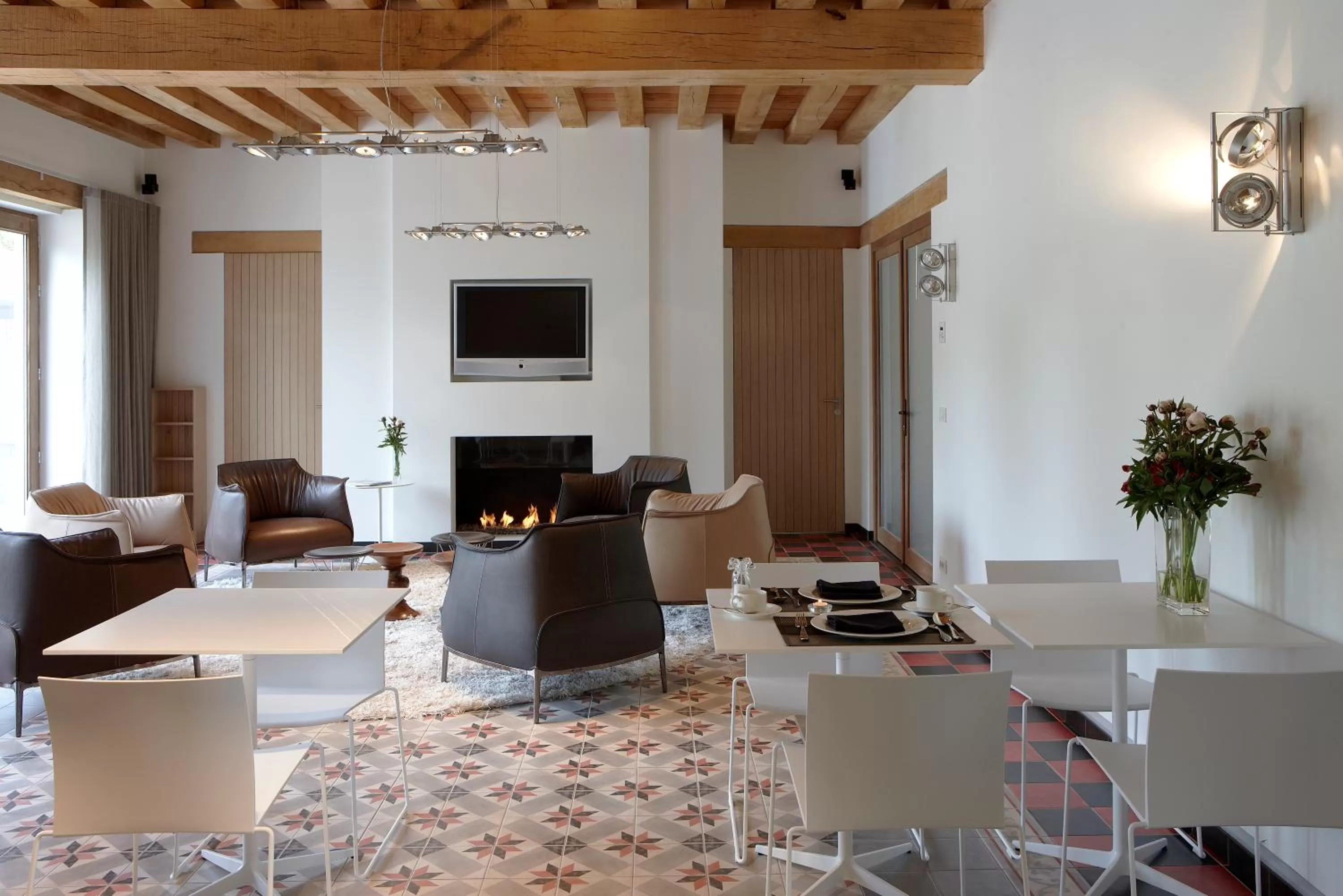 Communal lounge/ TV room in B&B Baron’s House Neerijse-Leuven