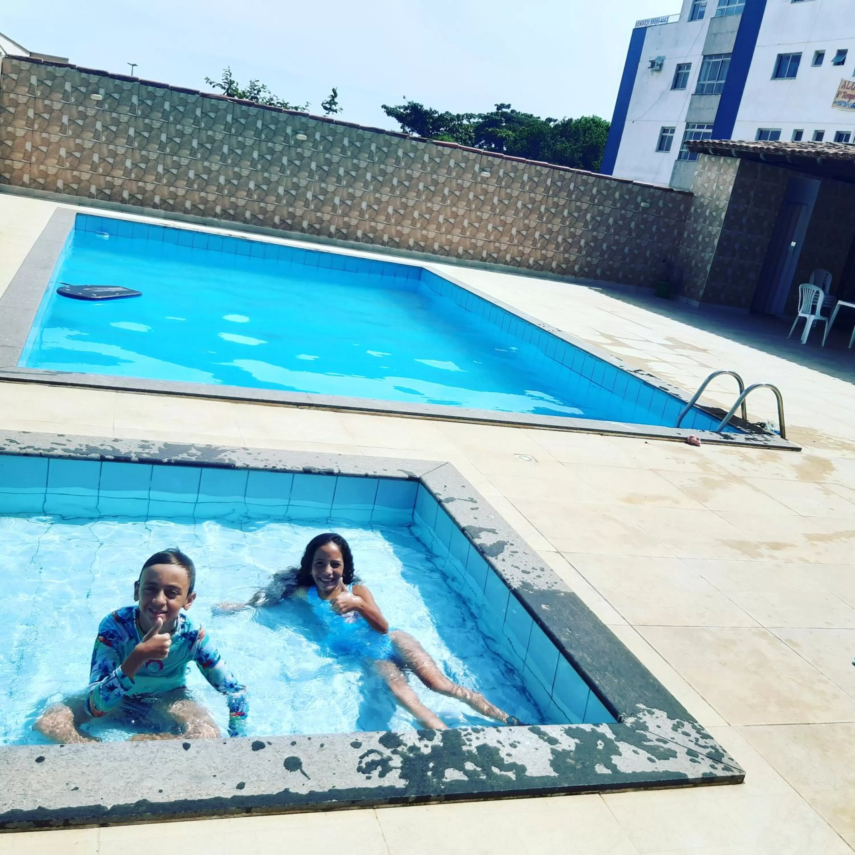 Swimming pool in Pousada Recanto Setiba
