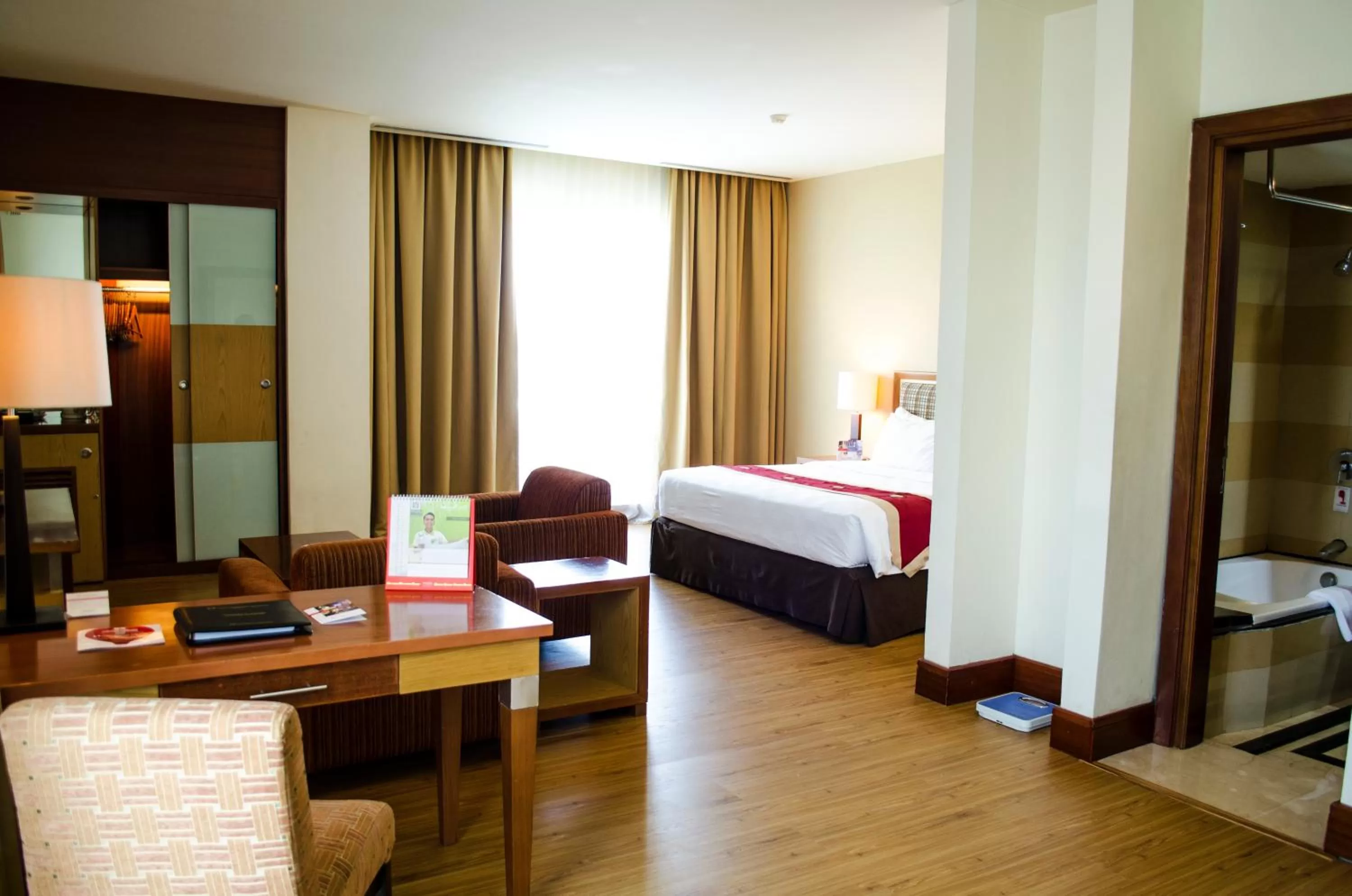 Bed in Swiss-Belhotel Maleosan Manado