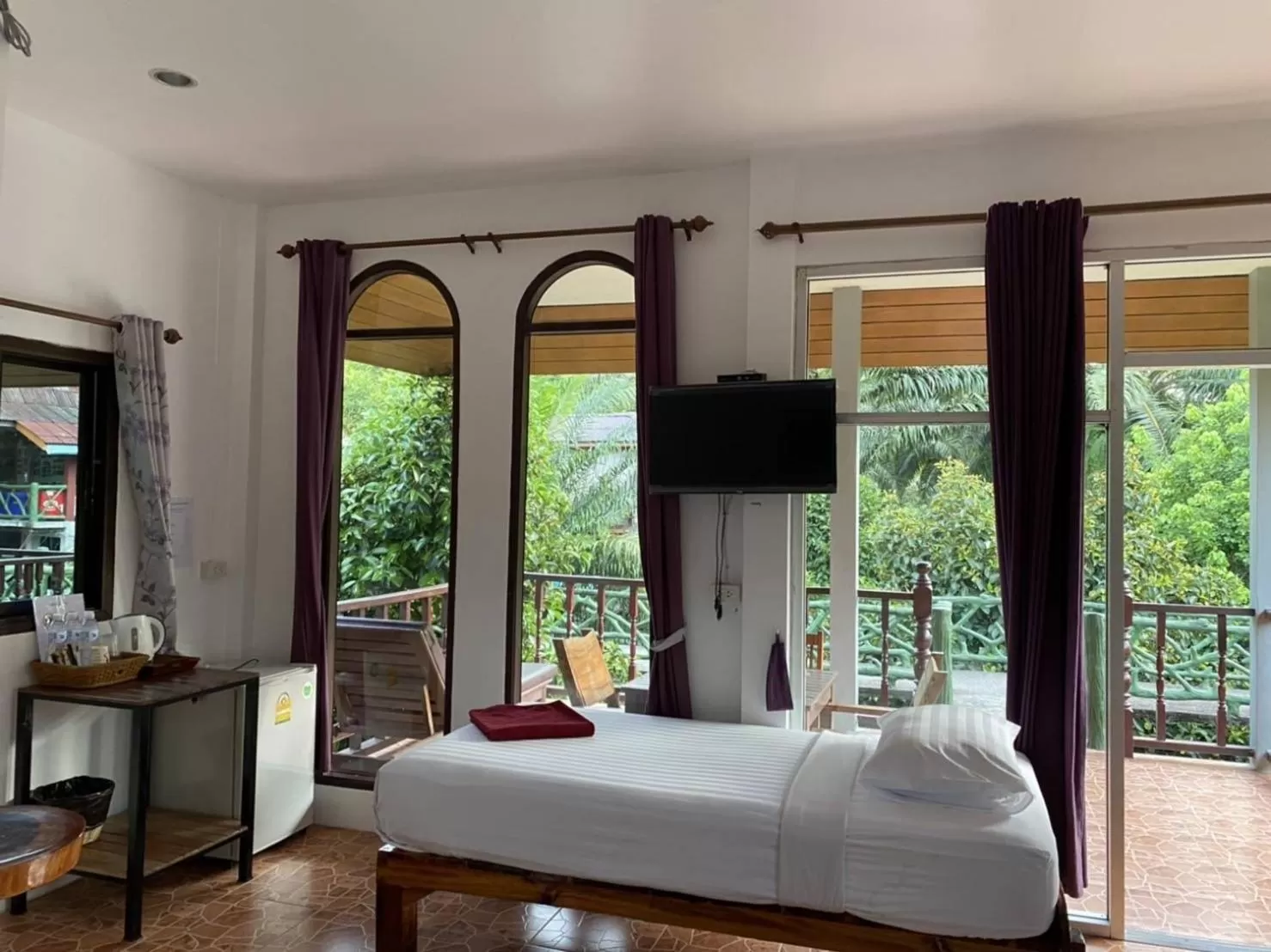 Bed in Khao Sok Jungle Huts Resort