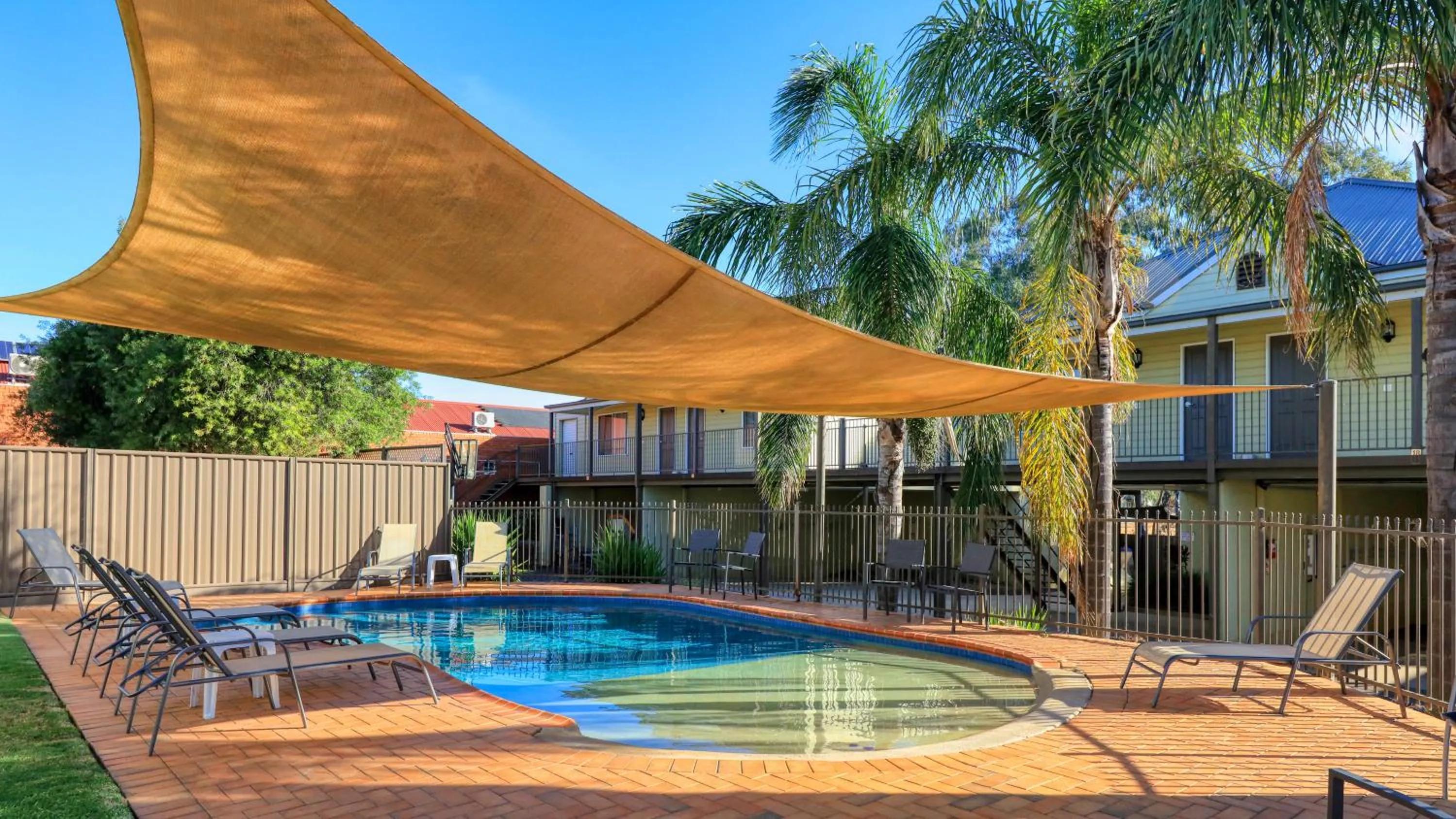 Swimming pool in Bridges on Meninya Motel & Apartments