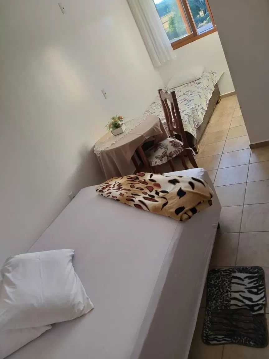 TV and multimedia, Bed in Hotel Pousada Rolantchê