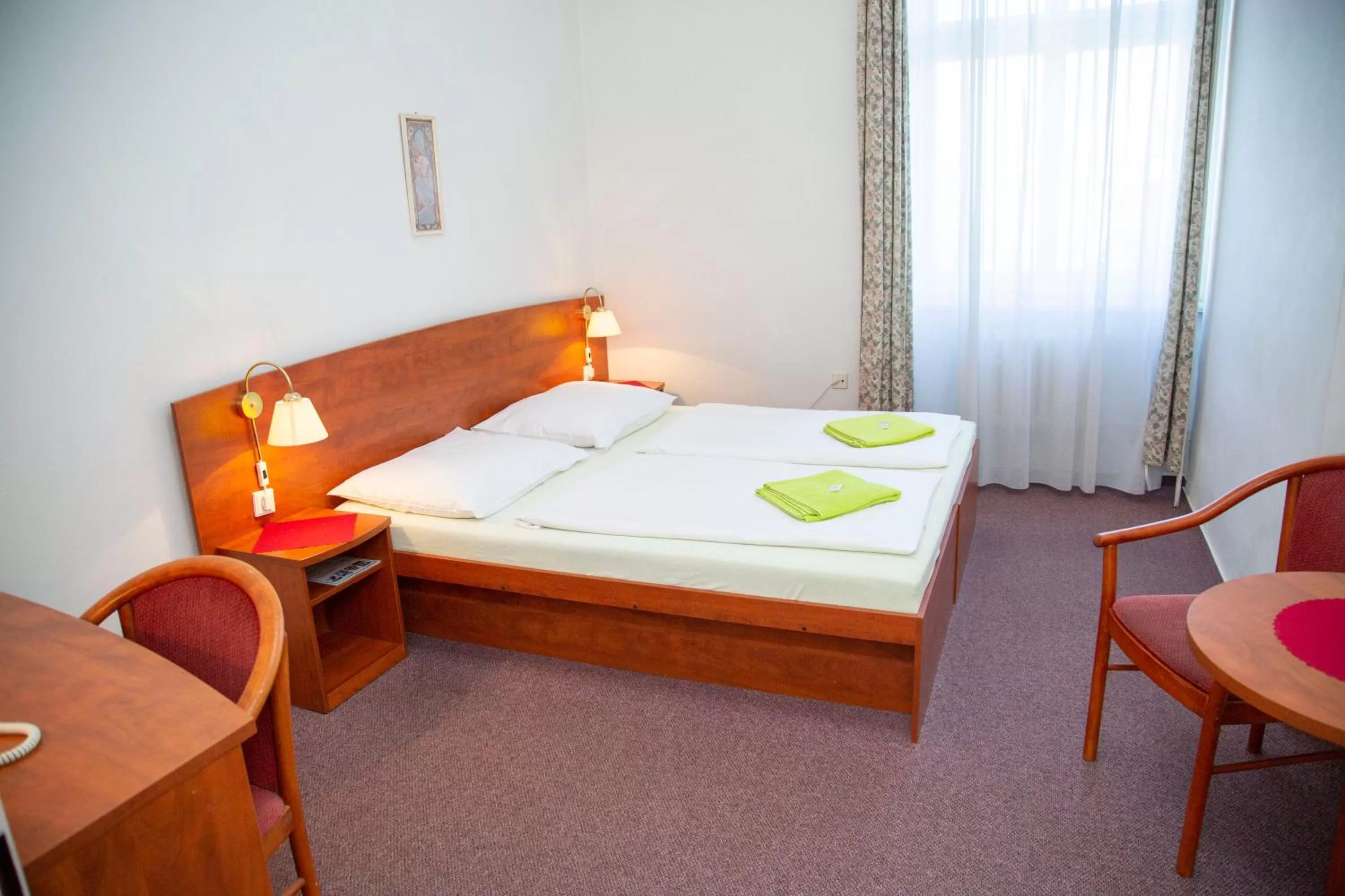 Living room, Bed in Wellness Hotel Central