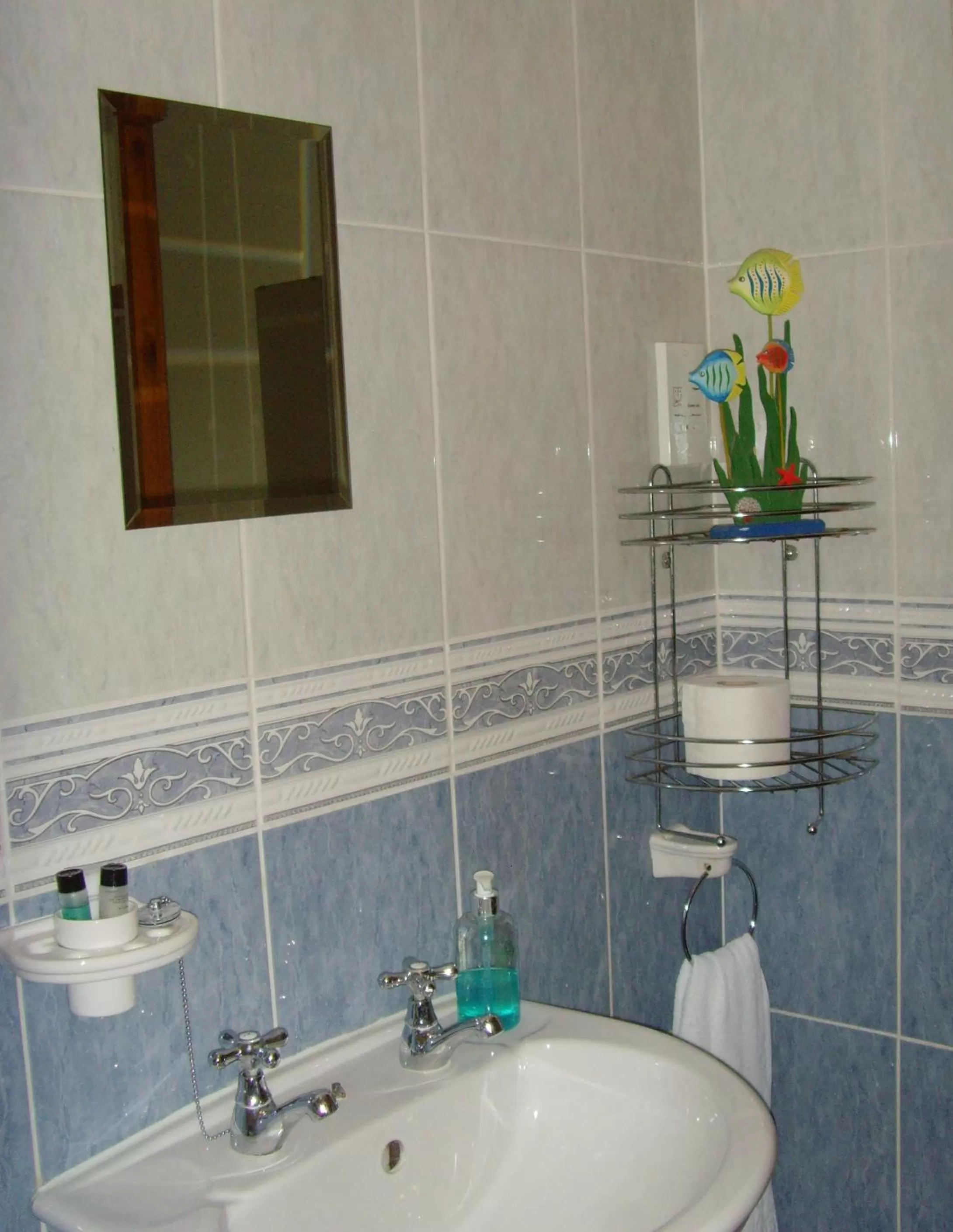 Toilet in Twin Lions Hotel