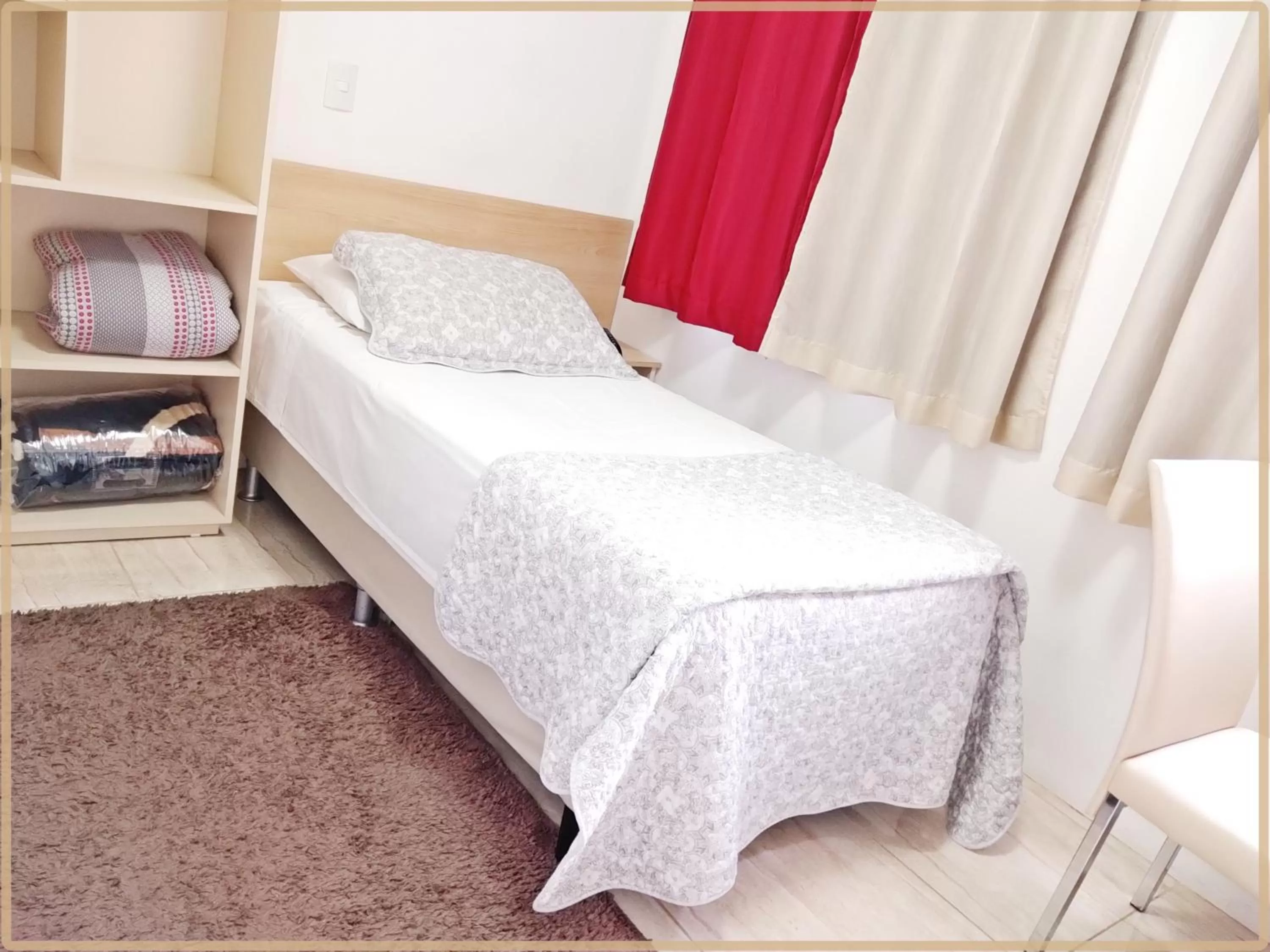 Bed in Hotel Anjos LTDA